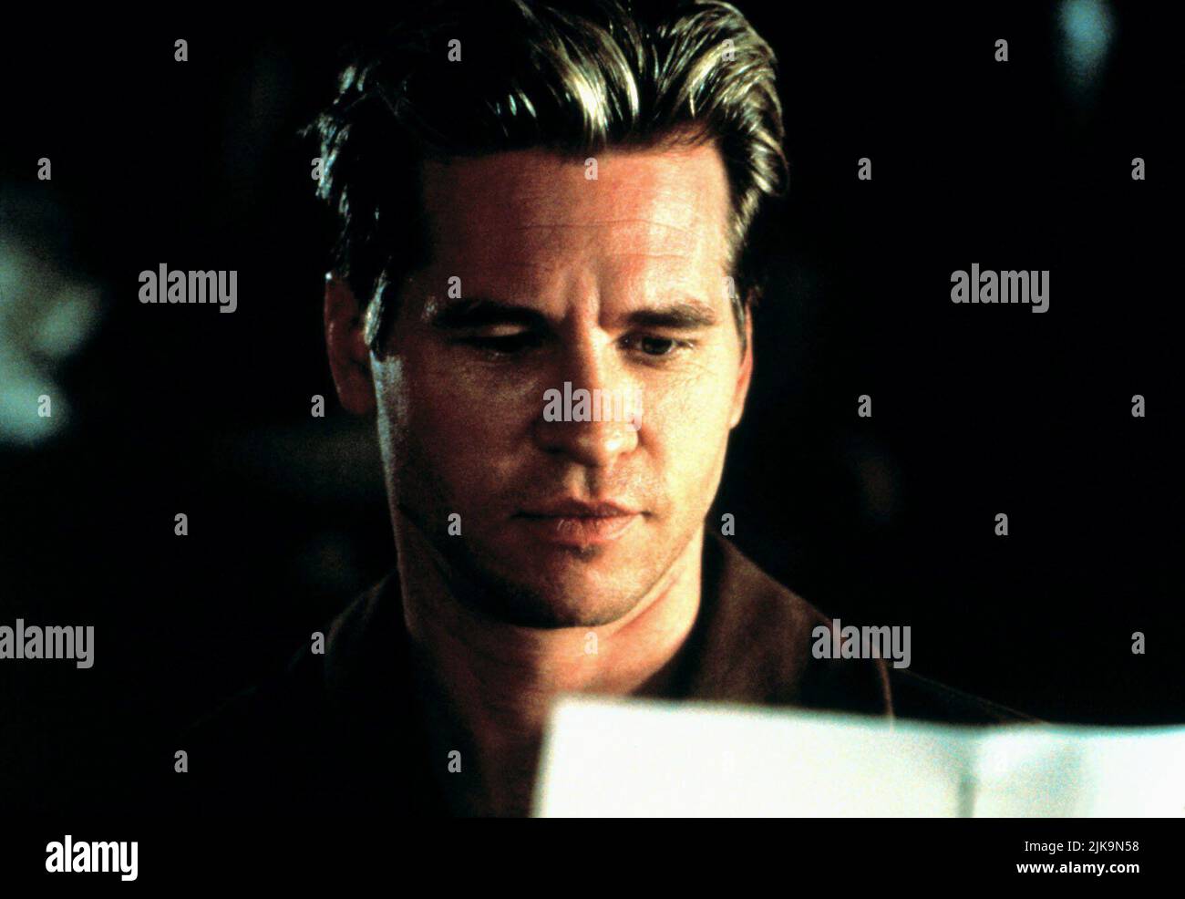 Val Kilmer Film: The Saint (USA 1997) Characters: Simon Templar  Director: Phillip Noyce 03 April 1997   **WARNING** This Photograph is for editorial use only and is the copyright of PARAMOUNT and/or the Photographer assigned by the Film or Production Company and can only be reproduced by publications in conjunction with the promotion of the above Film. A Mandatory Credit To PARAMOUNT is required. The Photographer should also be credited when known. No commercial use can be granted without written authority from the Film Company. Stock Photo