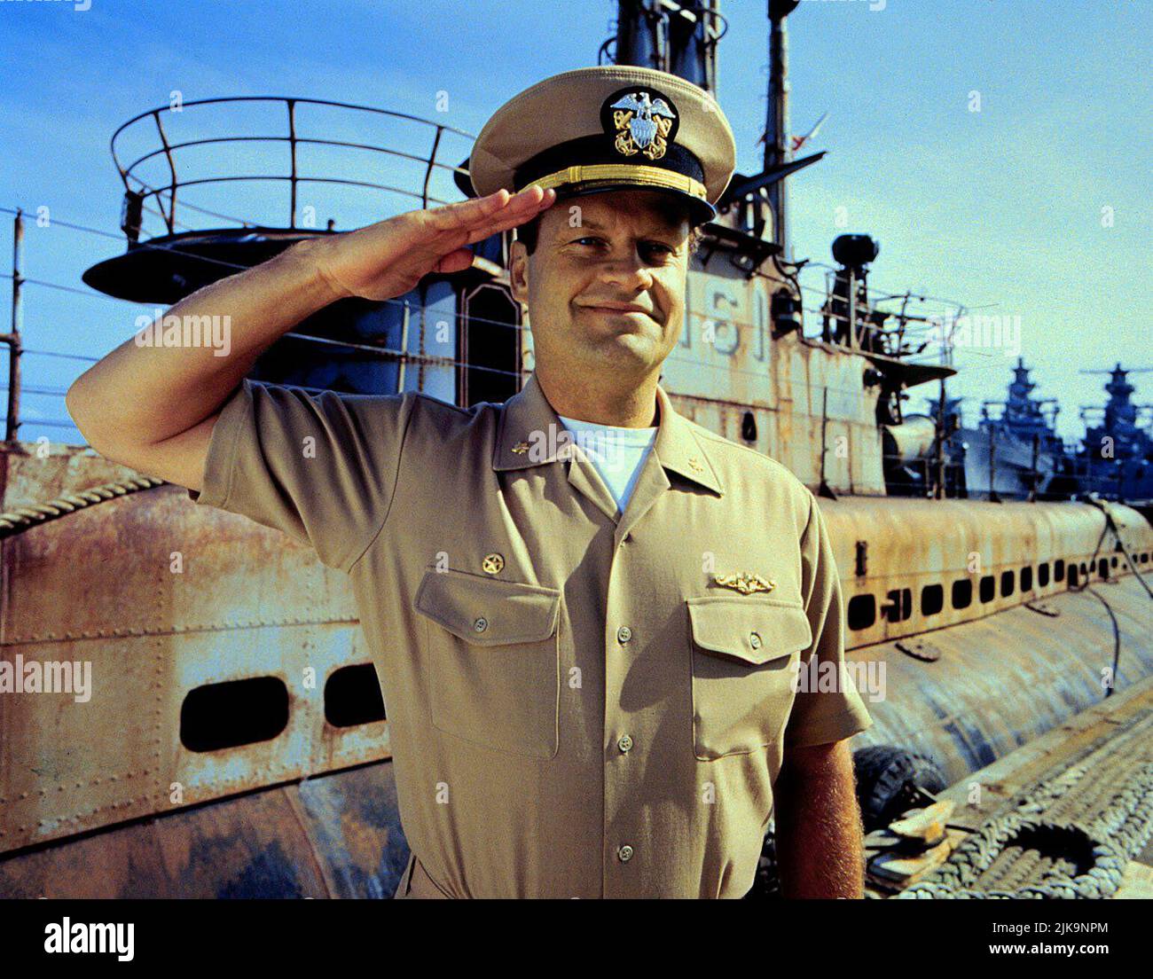 Kelsey Grammer Film: Down Periscope (USA 1996) Characters: Lt. Cmdr. Thomas 'Tom' Dodge  Director: David S. Ward 01 March 1996   **WARNING** This Photograph is for editorial use only and is the copyright of 20TH CENTURY FOX and/or the Photographer assigned by the Film or Production Company and can only be reproduced by publications in conjunction with the promotion of the above Film. A Mandatory Credit To 20TH CENTURY FOX is required. The Photographer should also be credited when known. No commercial use can be granted without written authority from the Film Company. Stock Photo