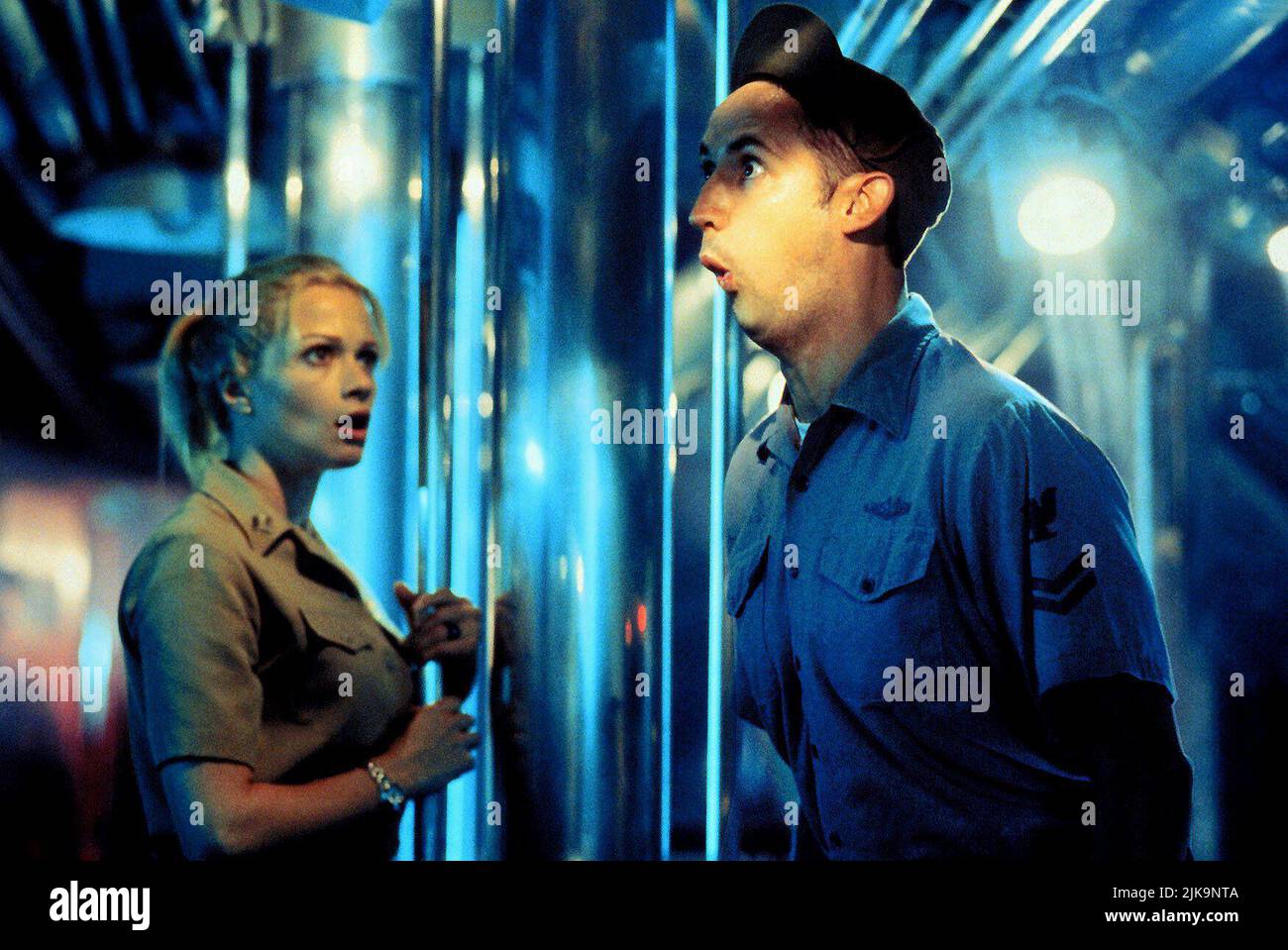 Lauren Holly & Harland Williams Film: Down Periscope (USA 1996) Characters: Lt. Emily Lake, Diving Officer,Seaman 2nd Class E.T. 'Sonar' Lovacelli  Director: David S. Ward 01 March 1996   **WARNING** This Photograph is for editorial use only and is the copyright of 20TH CENTURY FOX and/or the Photographer assigned by the Film or Production Company and can only be reproduced by publications in conjunction with the promotion of the above Film. A Mandatory Credit To 20TH CENTURY FOX is required. The Photographer should also be credited when known. No commercial use can be granted without written Stock Photo
