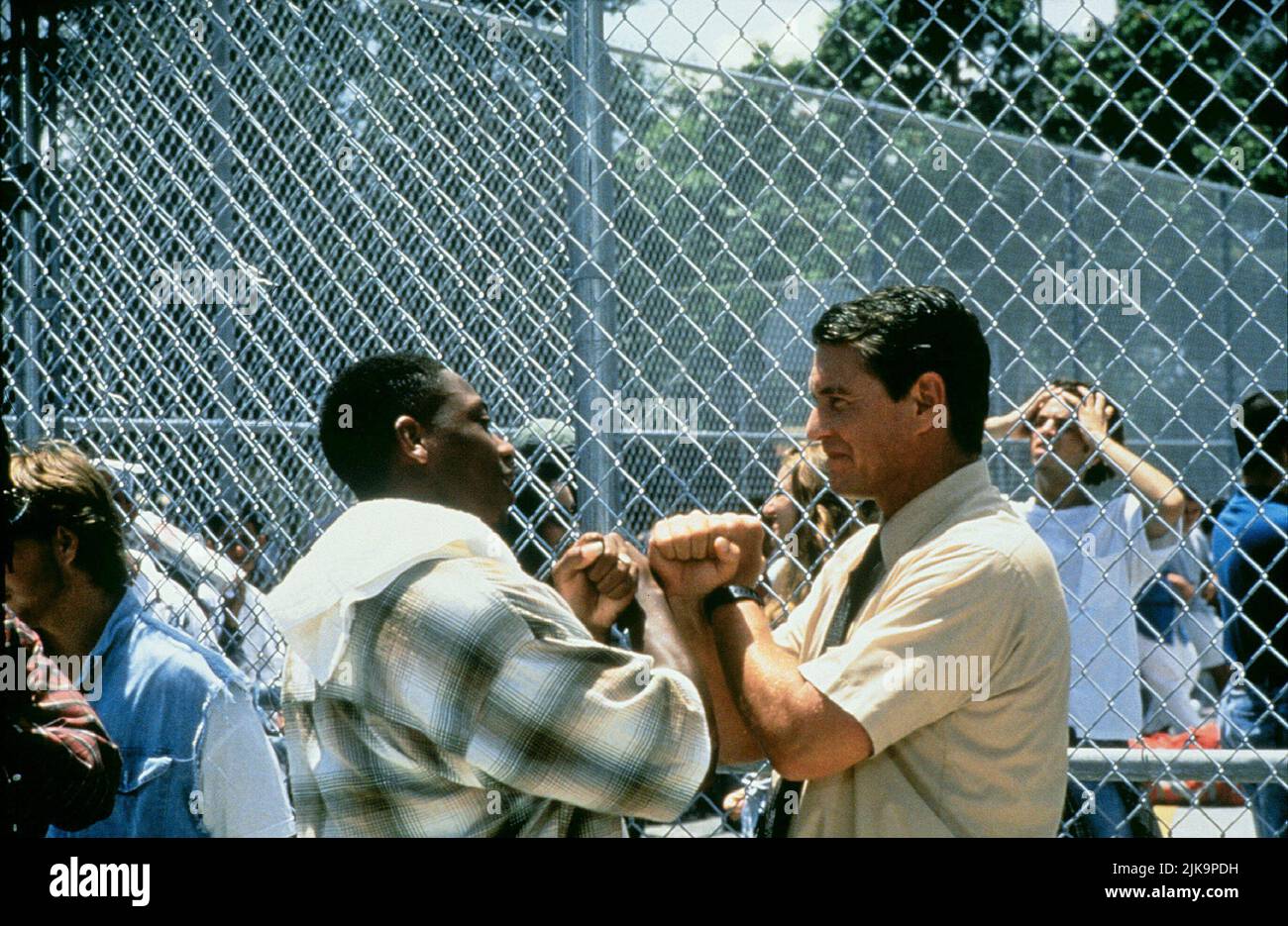 Sharron Corley & Tom Berenger Film The Substitute (1996) Characters Jerome Brown & Jonathan