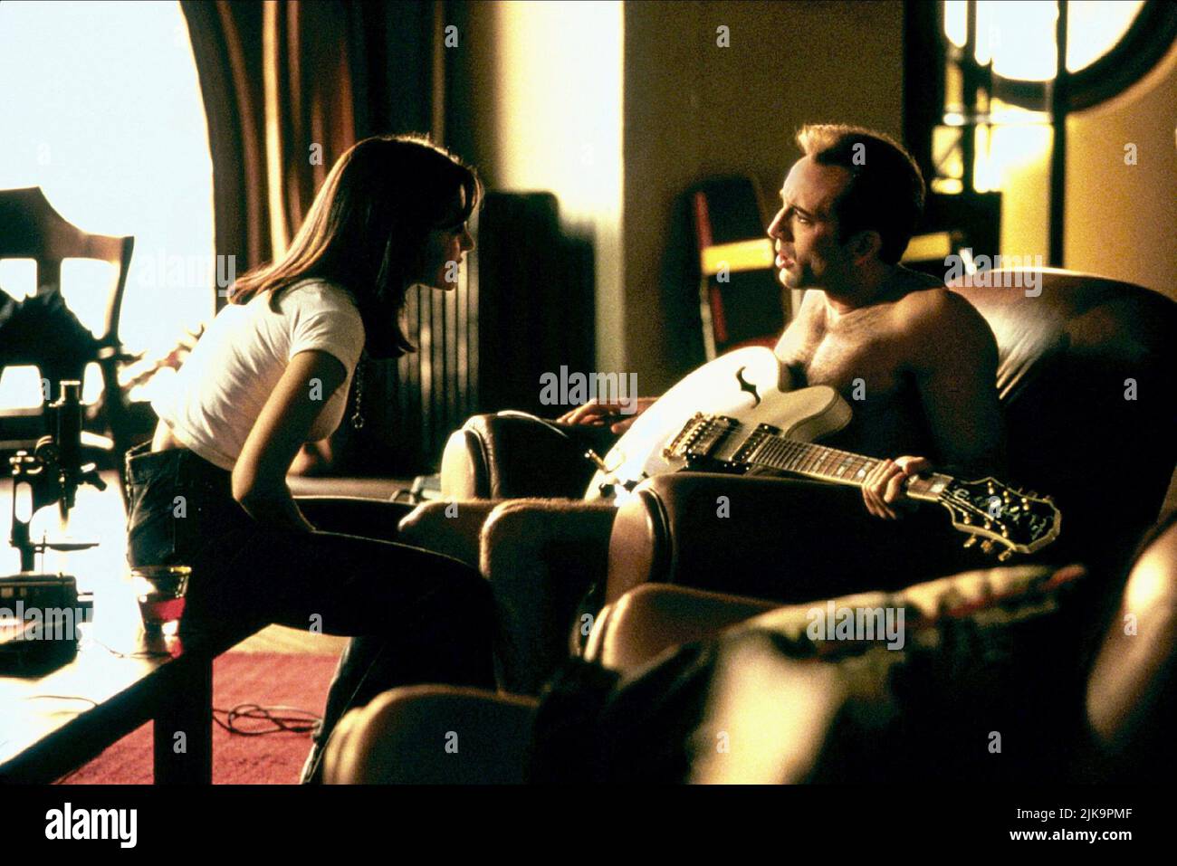 Vanessa Marcil & Nicolas Cage Film: The Rock (1996) Characters: Carla Pestalozzi & Dr. Stanley Goodspeed  Director: Michael Bay 01 June 1996   **WARNING** This Photograph is for editorial use only and is the copyright of BUENA VISTA and/or the Photographer assigned by the Film or Production Company and can only be reproduced by publications in conjunction with the promotion of the above Film. A Mandatory Credit To BUENA VISTA is required. The Photographer should also be credited when known. No commercial use can be granted without written authority from the Film Company. Stock Photo