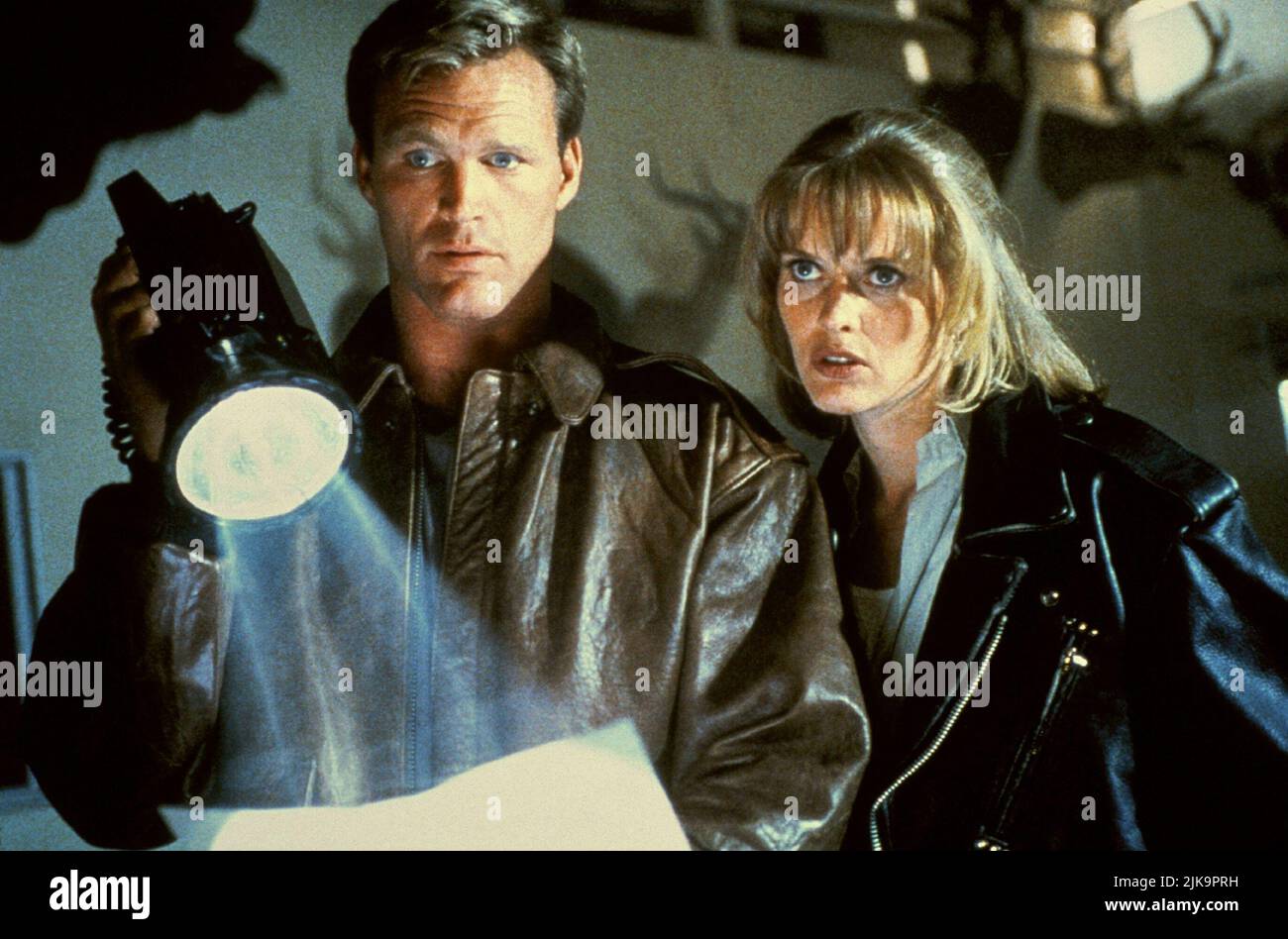 Brian Bosworth & Marta Dubois Film: Midnight Heat; Blackout (TV-Film) Characters: John Gray / Wayne Garret & Sharon  Usa 1996, Director: Allan A. Goldstein 26 January 1996   **WARNING** This Photograph is for editorial use only and is the copyright of MIDNIGHT HEAT PROD. and/or the Photographer assigned by the Film or Production Company and can only be reproduced by publications in conjunction with the promotion of the above Film. A Mandatory Credit To MIDNIGHT HEAT PROD. is required. The Photographer should also be credited when known. No commercial use can be granted without written authorit Stock Photo