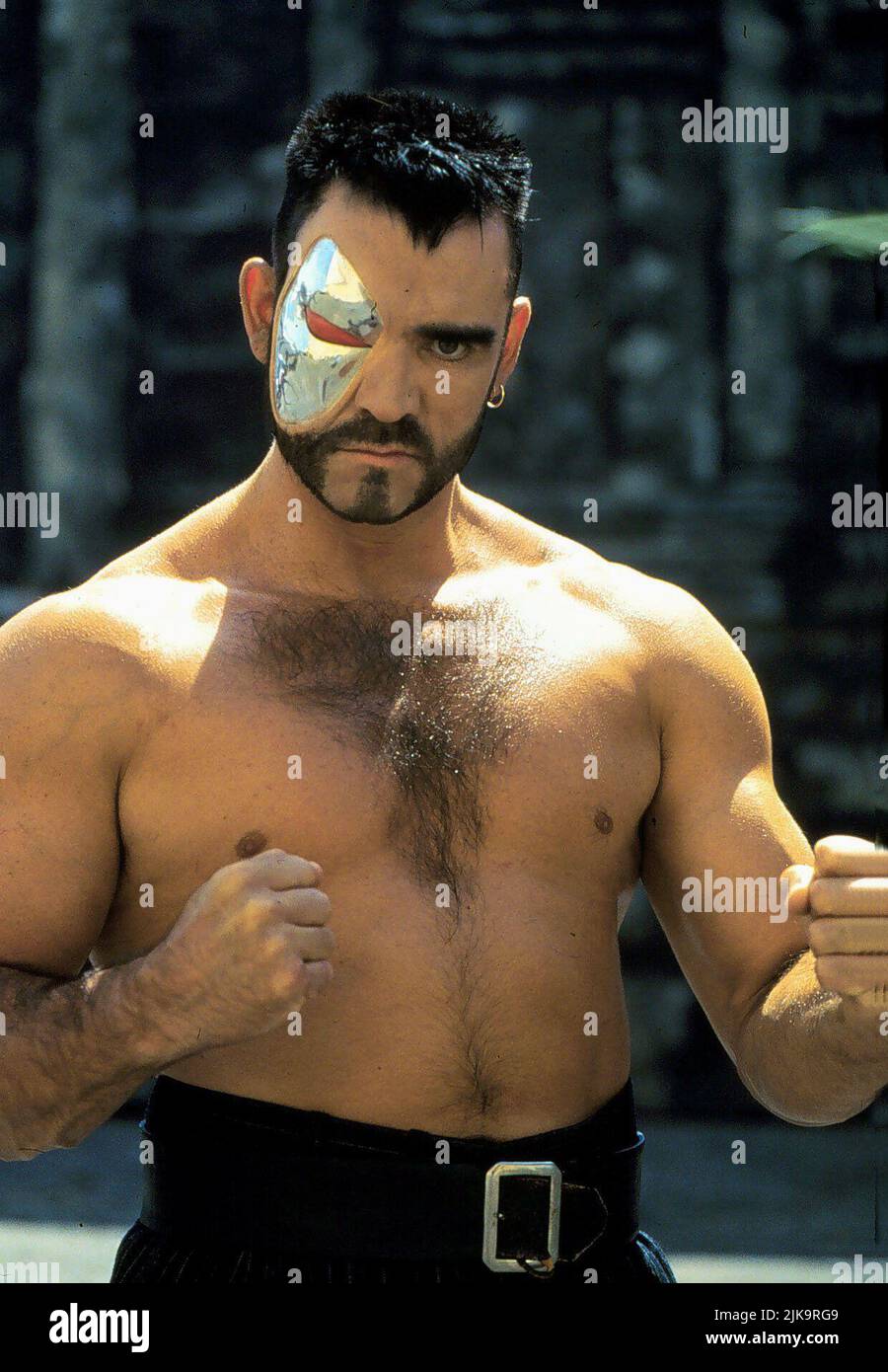 Trevor Goddard Film: Mortal Kombat (1995) Characters: Kano  Director: Paul W.S. Anderson 13 July 1995   **WARNING** This Photograph is for editorial use only and is the copyright of NEW LINE and/or the Photographer assigned by the Film or Production Company and can only be reproduced by publications in conjunction with the promotion of the above Film. A Mandatory Credit To NEW LINE is required. The Photographer should also be credited when known. No commercial use can be granted without written authority from the Film Company. Stock Photo