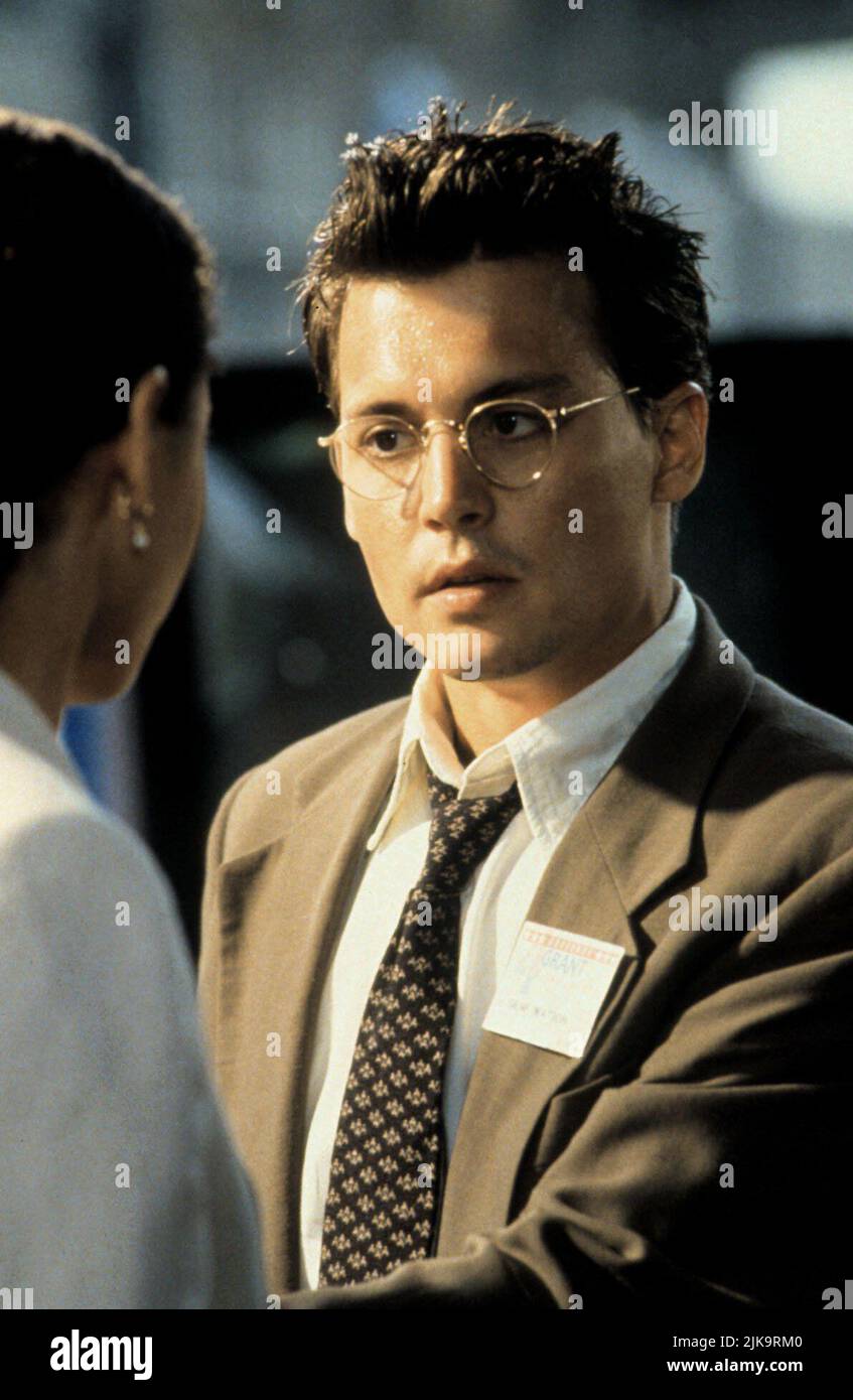 Johnny Depp Film: Nick Of Time (1995) Characters: Gene Watson  Director: John Badham 22 November 1995   **WARNING** This Photograph is for editorial use only and is the copyright of PARAMOUNT and/or the Photographer assigned by the Film or Production Company and can only be reproduced by publications in conjunction with the promotion of the above Film. A Mandatory Credit To PARAMOUNT is required. The Photographer should also be credited when known. No commercial use can be granted without written authority from the Film Company. Stock Photo