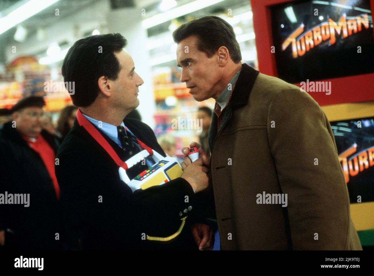 Arnold Schwarzenegger Film: Jingle All The Way (USA 1996) Characters: Howard Langston  Director: Brian Levant 16 November 1996   **WARNING** This Photograph is for editorial use only and is the copyright of 20TH CENTURY FOX and/or the Photographer assigned by the Film or Production Company and can only be reproduced by publications in conjunction with the promotion of the above Film. A Mandatory Credit To 20TH CENTURY FOX is required. The Photographer should also be credited when known. No commercial use can be granted without written authority from the Film Company. Stock Photo