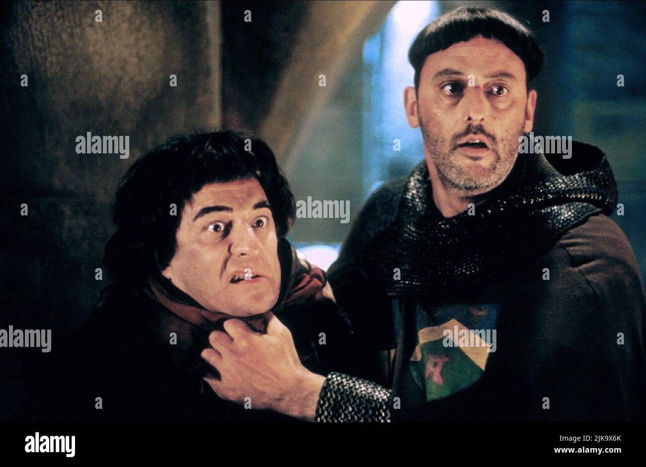 Christian Clavier & Jean Reno Film: Les Couloirs Du Temps: Les Visiteurs Ii; The Corridors Of Time: The Visitors Ii (Les couloirs du temps: Les visiteurs II) Characters: Jacquouille la Fripouille, Comte Godefroy de Montmirail  Fr 1998, Director: Jean-Marie Poire 11 February 1998   **WARNING** This Photograph is for editorial use only and is the copyright of GAUMONT and/or the Photographer assigned by the Film or Production Company and can only be reproduced by publications in conjunction with the promotion of the above Film. A Mandatory Credit To GAUMONT is required. The Photographer should al Stock Photo