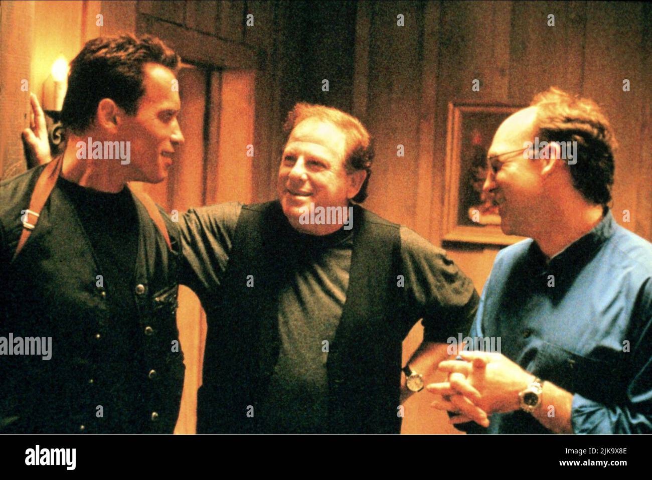 Arnold Schwarzenegger & Chuck Russell Film: Eraser (1998)   Director: Chuck Russell 21 June 1996   **WARNING** This Photograph is for editorial use only and is the copyright of WARNER BROS and/or the Photographer assigned by the Film or Production Company and can only be reproduced by publications in conjunction with the promotion of the above Film. A Mandatory Credit To WARNER BROS is required. The Photographer should also be credited when known. No commercial use can be granted without written authority from the Film Company. Stock Photo
