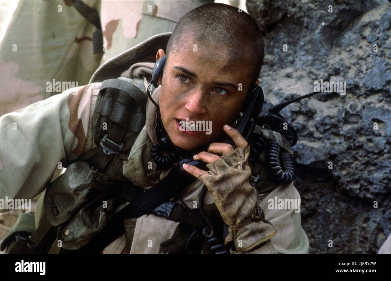 Demi Moore Film: G.I. Jane; Gi Jane (1997) Characters: Jordan O'Neill  Director: Ridley Scott 01 April 1997   **WARNING** This Photograph is for editorial use only and is the copyright of HOLLYWOOD PICTURES and/or the Photographer assigned by the Film or Production Company and can only be reproduced by publications in conjunction with the promotion of the above Film. A Mandatory Credit To HOLLYWOOD PICTURES is required. The Photographer should also be credited when known. No commercial use can be granted without written authority from the Film Company. Stock Photo