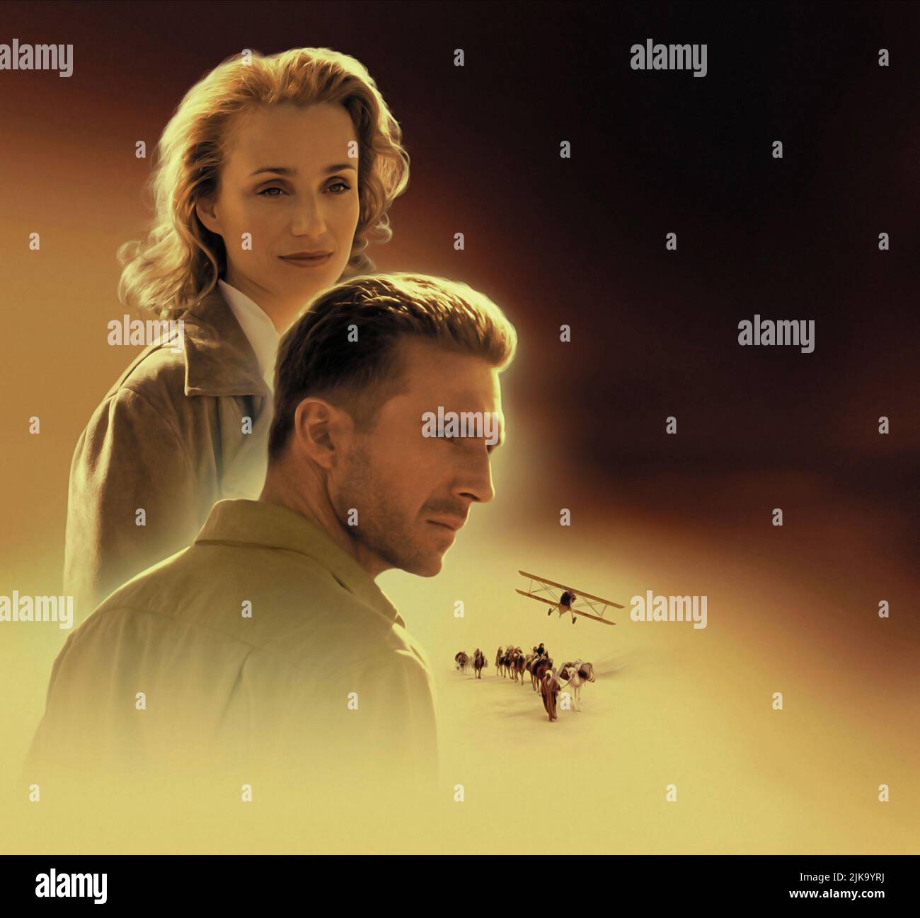 Kristin Scott Thomas & Ralph Fiennes Film: The English Patient (USA/UK 1996) Characters: Katharine Clifton, Count Laszlo de Almasy  Director: Anthony Minghella 06 November 1996   **WARNING** This Photograph is for editorial use only and is the copyright of TIGER MOTH PRODUCTIONS and/or the Photographer assigned by the Film or Production Company and can only be reproduced by publications in conjunction with the promotion of the above Film. A Mandatory Credit To TIGER MOTH PRODUCTIONS is required. The Photographer should also be credited when known. No commercial use can be granted without writt Stock Photo