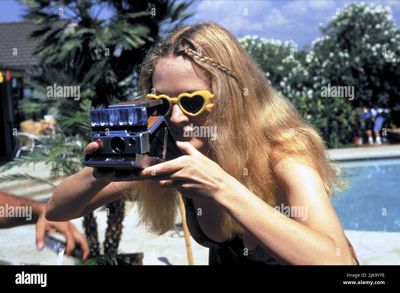Heather Graham Film: Boogie Nights (USA 1997) Characters: Rollergirl  Director: Paul Thomas Anderson 11 September 1997   **WARNING** This Photograph is for editorial use only and is the copyright of NEW LINE CINEMA and/or the Photographer assigned by the Film or Production Company and can only be reproduced by publications in conjunction with the promotion of the above Film. A Mandatory Credit To NEW LINE CINEMA is required. The Photographer should also be credited when known. No commercial use can be granted without written authority from the Film Company. Stock Photo