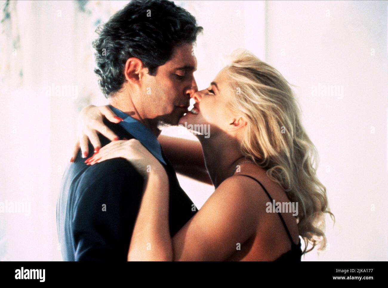 Joey Travolta & Anna Nicole Smith Film: To The Limit (1995) Characters: Frank DaVinci, Colette Dubois / Vickie Linn  Director: Raymond Martino 19 September 1995   **WARNING** This Photograph is for editorial use only and is the copyright of The Film Company and/or the Photographer assigned by the Film or Production Company and can only be reproduced by publications in conjunction with the promotion of the above Film. A Mandatory Credit To The Film Company is required. The Photographer should also be credited when known. No commercial use can be granted without written authority from the Film C Stock Photo