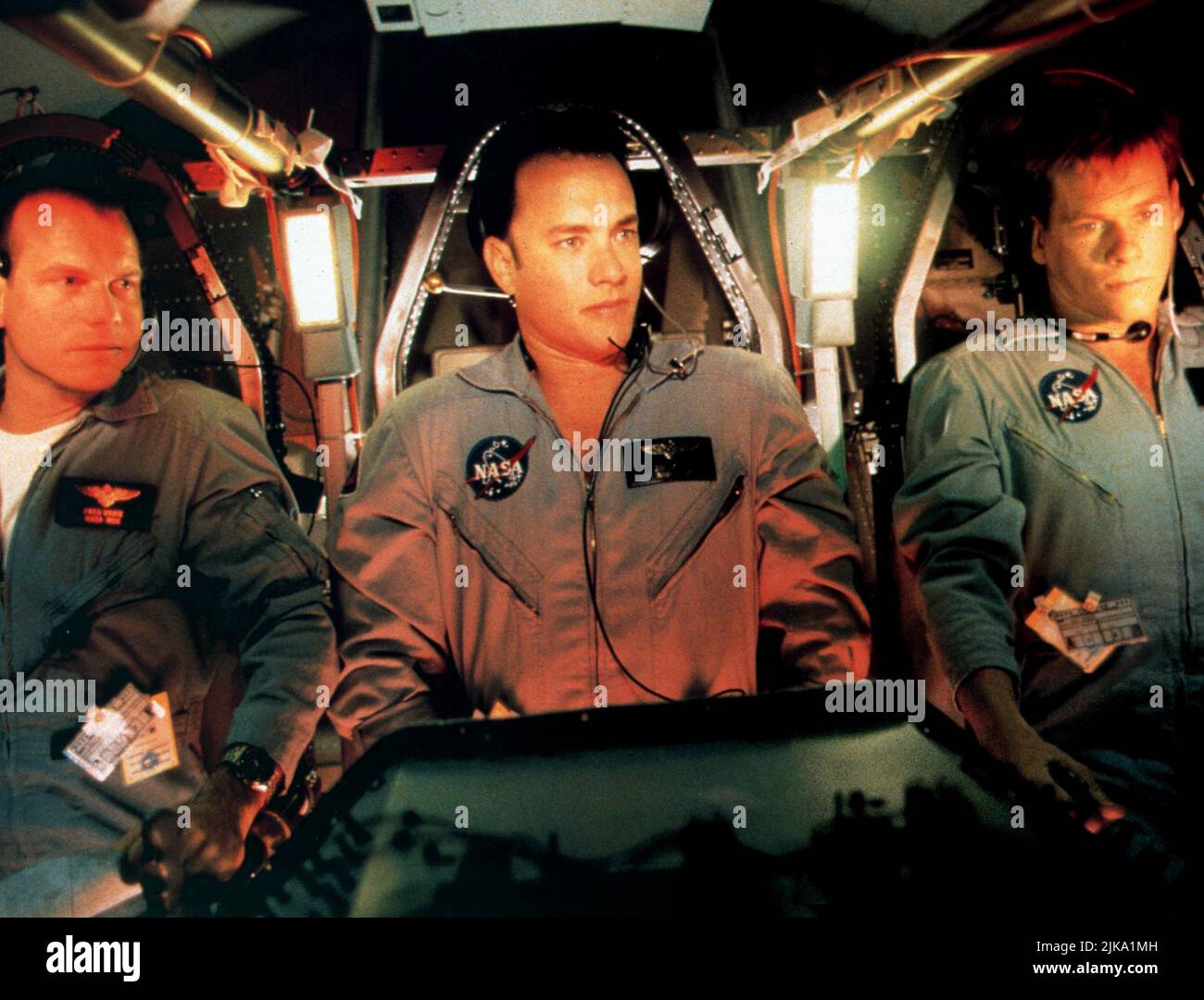 Bill Paxton, Tom Hanks, Kevin Bacon Film: Apollo 13 (USA 1995) Characters: Fred Haise,Jim Lovell,Jack Swigert  Director: Ron Howard 22 June 1995   **WARNING** This Photograph is for editorial use only and is the copyright of UNIVERSAL and/or the Photographer assigned by the Film or Production Company and can only be reproduced by publications in conjunction with the promotion of the above Film. A Mandatory Credit To UNIVERSAL is required. The Photographer should also be credited when known. No commercial use can be granted without written authority from the Film Company. Stock Photo