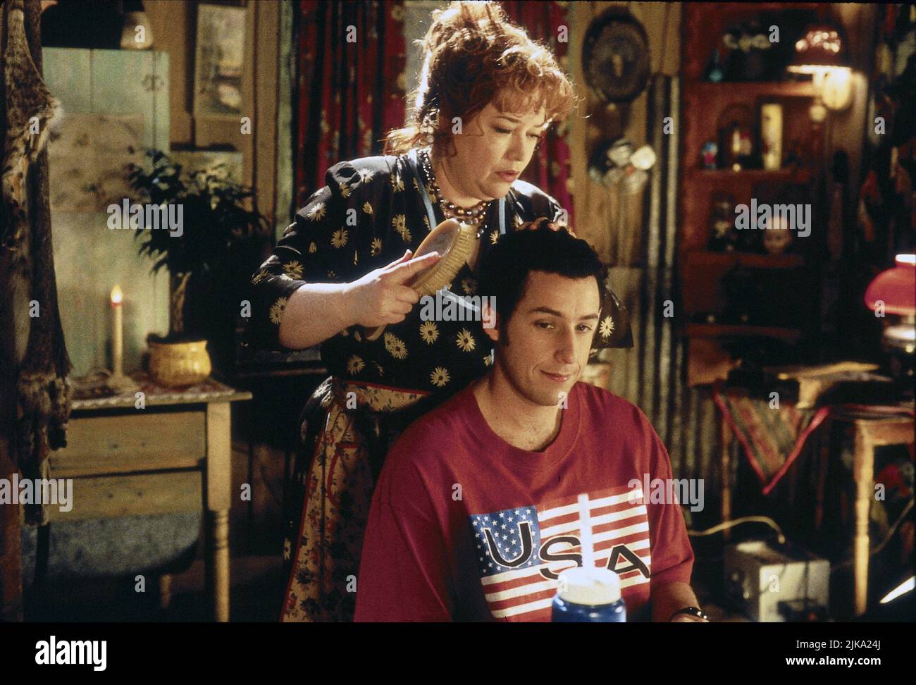 Kathy Bates & Adam Sandler Film: The Waterboy (1998) Characters: Helen 'Mama' Boucher & Robert 'Bobby' Boucher Jr.  Director: Frank Coraci 06 November 1998   **WARNING** This Photograph is for editorial use only and is the copyright of TOUCHSTONE and/or the Photographer assigned by the Film or Production Company and can only be reproduced by publications in conjunction with the promotion of the above Film. A Mandatory Credit To TOUCHSTONE is required. The Photographer should also be credited when known. No commercial use can be granted without written authority from the Film Company. Stock Photo