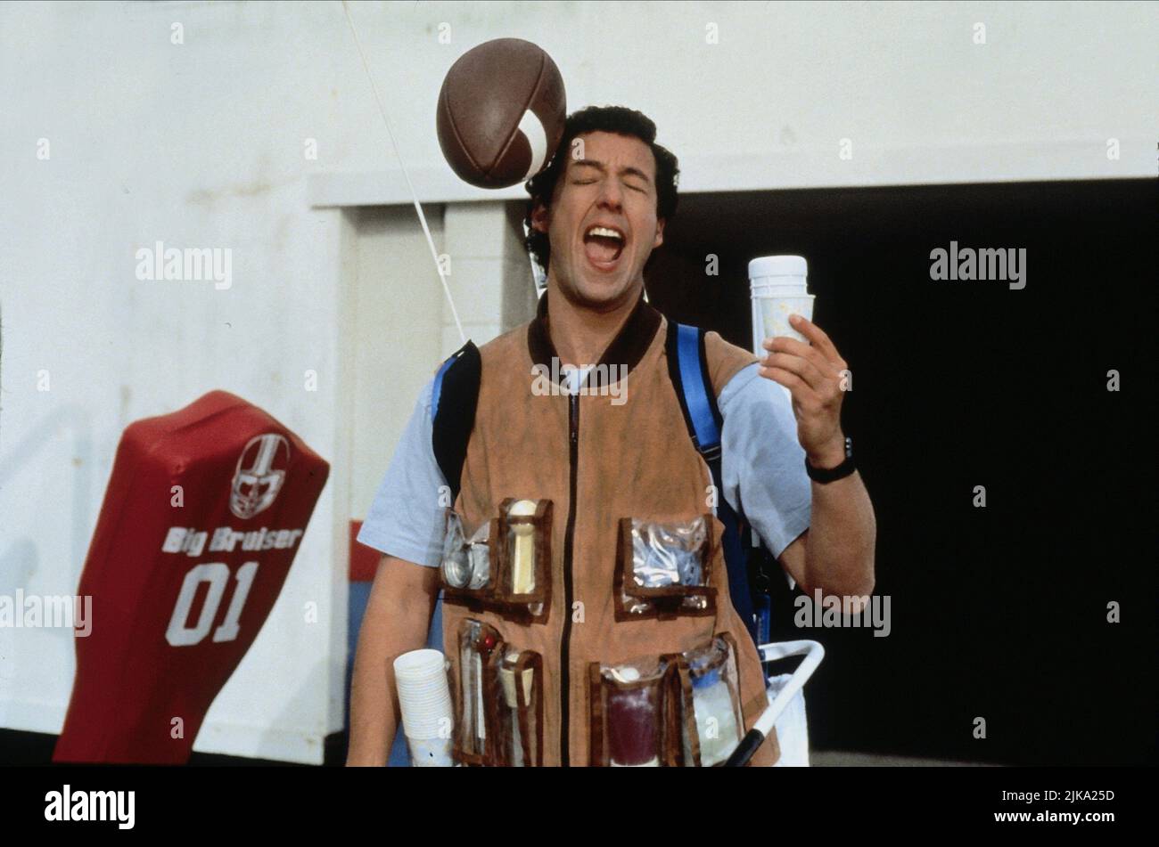 Adam Sandler Film: The Waterboy (1997) Characters: Robert 'Bobby' Boucher Jr.  Director: Frank Coraci 06 November 1998   **WARNING** This Photograph is for editorial use only and is the copyright of TOUCHSTONE and/or the Photographer assigned by the Film or Production Company and can only be reproduced by publications in conjunction with the promotion of the above Film. A Mandatory Credit To TOUCHSTONE is required. The Photographer should also be credited when known. No commercial use can be granted without written authority from the Film Company. Stock Photo