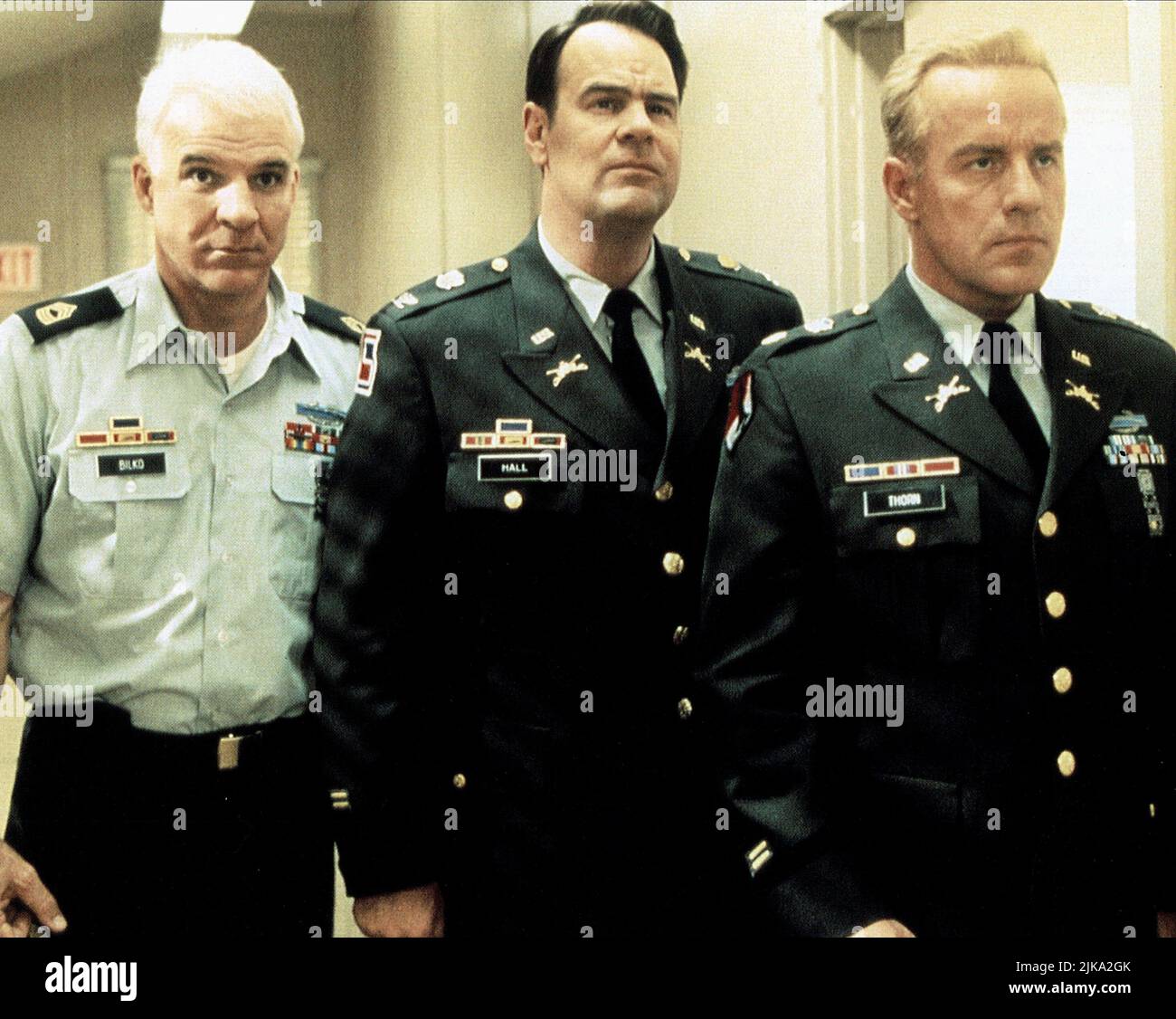 Dan Aykroyd, Steve Martin & Phil Hartman Film: Sgt. Bilko (1995) Characters: Colonel John T. Hall,Master Sergeant Ernest G. Bilko & Major Colin Thorn  Director: Jonathan Lynn 29 March 1996   **WARNING** This Photograph is for editorial use only and is the copyright of UNIVERSAL and/or the Photographer assigned by the Film or Production Company and can only be reproduced by publications in conjunction with the promotion of the above Film. A Mandatory Credit To UNIVERSAL is required. The Photographer should also be credited when known. No commercial use can be granted without written authority f Stock Photo