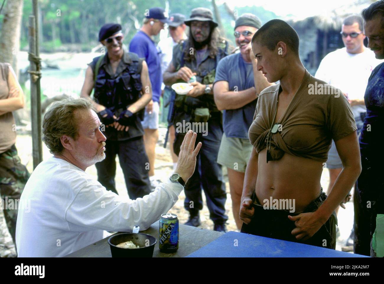 Ridley Scott & Demi Moore Film: G.I. Jane; Gi Jane (1997) Characters: & Jordan O'Neill  Director: Ridley Scott 01 April 1997   **WARNING** This Photograph is for editorial use only and is the copyright of HOLLYWOOD PICTURES and/or the Photographer assigned by the Film or Production Company and can only be reproduced by publications in conjunction with the promotion of the above Film. A Mandatory Credit To HOLLYWOOD PICTURES is required. The Photographer should also be credited when known. No commercial use can be granted without written authority from the Film Company. Stock Photo