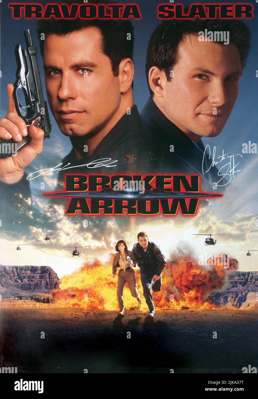 John Travolta, Samantha Mathis & Christian Slater Poster Film: Broken Arrow (USA 1996) Characters: Maj. Vic 'Deak' Deakins,  Director: John Woo 09 February 1996   **WARNING** This Photograph is for editorial use only and is the copyright of 20TH CENTURY FOX and/or the Photographer assigned by the Film or Production Company and can only be reproduced by publications in conjunction with the promotion of the above Film. A Mandatory Credit To 20TH CENTURY FOX is required. The Photographer should also be credited when known. No commercial use can be granted without written authority from the Film C Stock Photo
