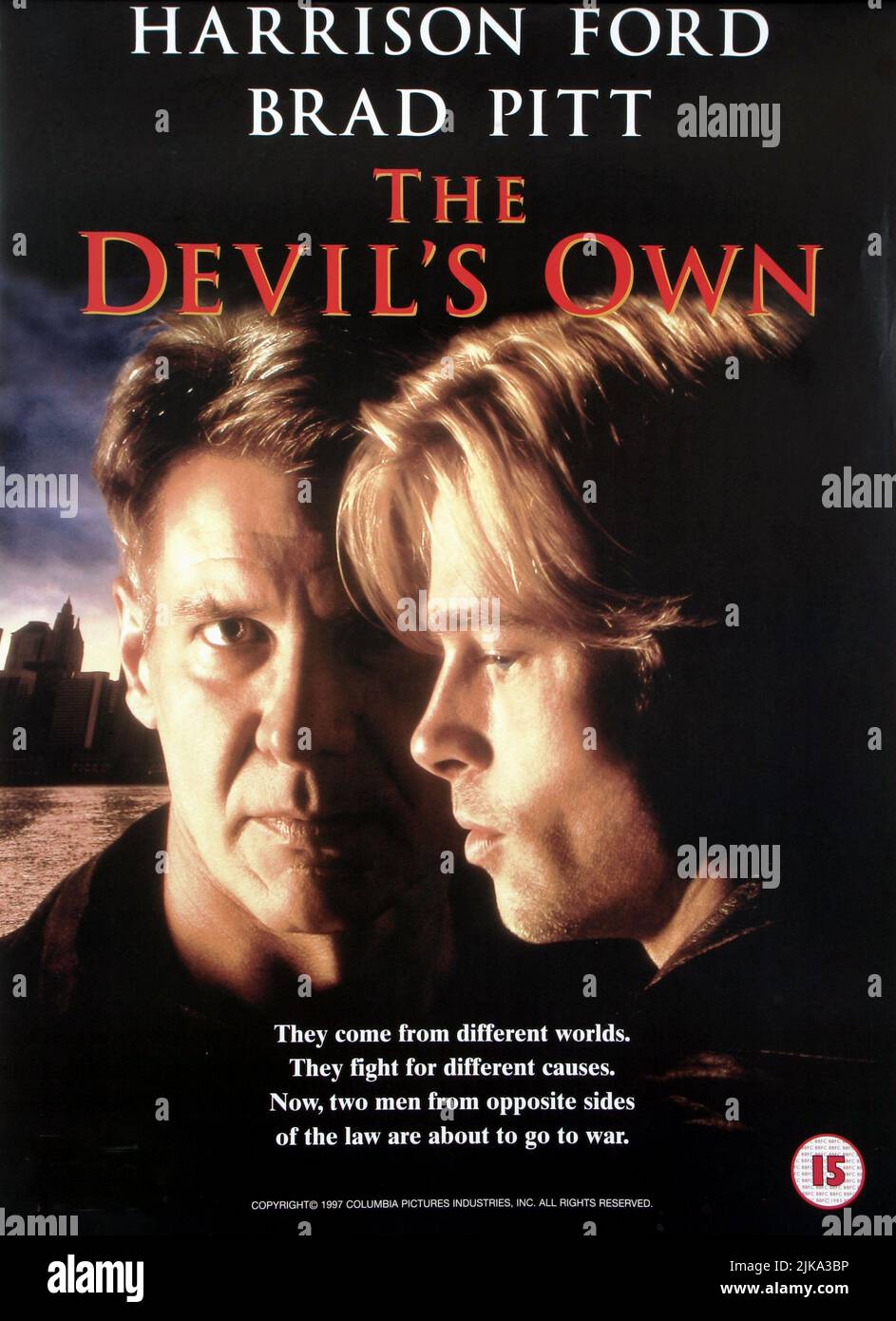 Harrison Ford & Brad Pitt Poster Film: The Devil'S Own (USA 1997) Characters: Tom O'Meara &  Director: Alan J. Pakula 13 March 1997   **WARNING** This Photograph is for editorial use only and is the copyright of COLUMBIA PICTURES and/or the Photographer assigned by the Film or Production Company and can only be reproduced by publications in conjunction with the promotion of the above Film. A Mandatory Credit To COLUMBIA PICTURES is required. The Photographer should also be credited when known. No commercial use can be granted without written authority from the Film Company. Stock Photo