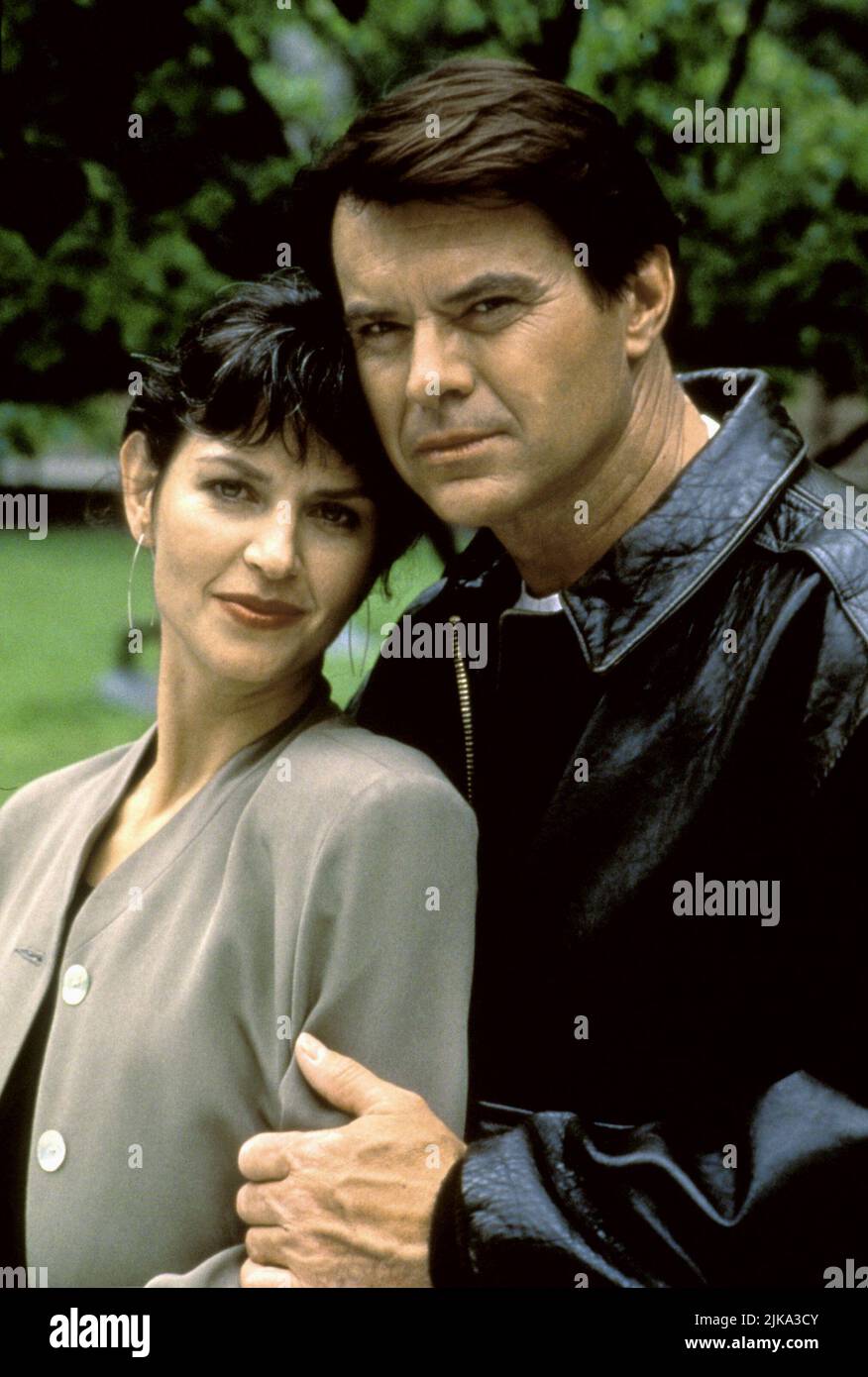 Wendy Crewson & Robert Urich Film: Spenser: A Savage Place (1998) Characters: Susan Silverman & Spenser  Director: Joseph L. Scanlan 02 June 1995   **WARNING** This Photograph is for editorial use only and is the copyright of WARNER BROS and/or the Photographer assigned by the Film or Production Company and can only be reproduced by publications in conjunction with the promotion of the above Film. A Mandatory Credit To WARNER BROS is required. The Photographer should also be credited when known. No commercial use can be granted without written authority from the Film Company. Stock Photo