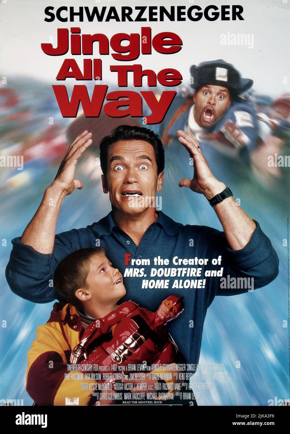 Jake Lloyd, Arnold Schwarzenegger & Sinbad Poster Film: Jingle All The Way (USA 1996) Characters: Jamie Langston,Howard Langston &  Director: Brian Levant 16 November 1996   **WARNING** This Photograph is for editorial use only and is the copyright of 20TH CENTURY FOX and/or the Photographer assigned by the Film or Production Company and can only be reproduced by publications in conjunction with the promotion of the above Film. A Mandatory Credit To 20TH CENTURY FOX is required. The Photographer should also be credited when known. No commercial use can be granted without written authority from Stock Photo