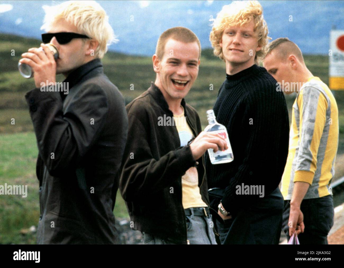 Jonny Lee Miller, Ewan Mcgregor, Kevin Mckidd & Ewen Bremner Film: Trainspotting (UK 1996) Characters: Sick Boy,Renton,Tommy & Spud  Director: Danny Boyle 23 February 1996   **WARNING** This Photograph is for editorial use only and is the copyright of CHANNEL FOUR FILMS and/or the Photographer assigned by the Film or Production Company and can only be reproduced by publications in conjunction with the promotion of the above Film. A Mandatory Credit To CHANNEL FOUR FILMS is required. The Photographer should also be credited when known. No commercial use can be granted without written authority Stock Photo