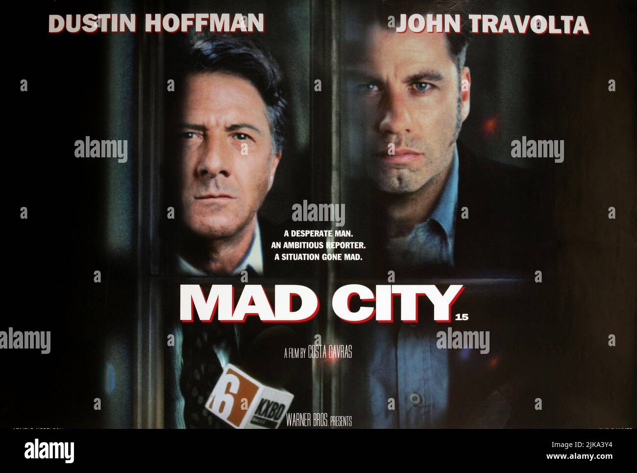 Dustin Hoffman & John Travolta Poster Film: Mad City (1997) Characters: Max Brackett &  Director: Costa-Gavras 10 October 1997   **WARNING** This Photograph is for editorial use only and is the copyright of WARNER BROS and/or the Photographer assigned by the Film or Production Company and can only be reproduced by publications in conjunction with the promotion of the above Film. A Mandatory Credit To WARNER BROS is required. The Photographer should also be credited when known. No commercial use can be granted without written authority from the Film Company. Stock Photo