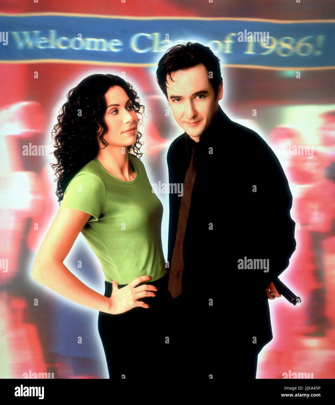 Minnie Driver & John Cusack Film: Grosse Pointe Blank (1997) Characters: Debi Newberry & Martin Q. Blank  Director: George Armitage 11 April 1997   **WARNING** This Photograph is for editorial use only and is the copyright of BUENA VISTA and/or the Photographer assigned by the Film or Production Company and can only be reproduced by publications in conjunction with the promotion of the above Film. A Mandatory Credit To BUENA VISTA is required. The Photographer should also be credited when known. No commercial use can be granted without written authority from the Film Company. Stock Photo