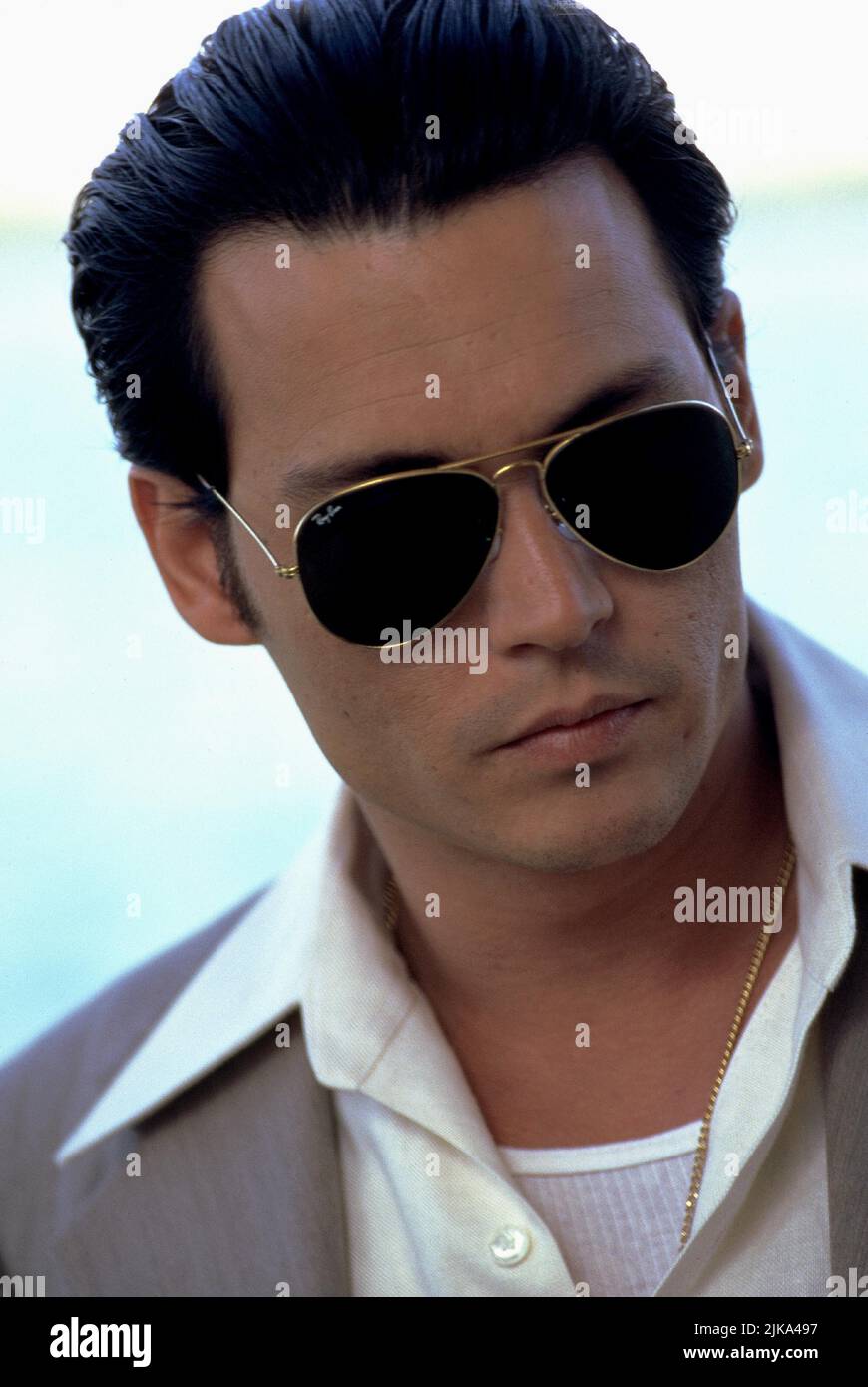 Johnny Depp Film: Donnie Brasco (1997) Characters: Donnie Brasco  Director: Mike Newell 28 February 1997   **WARNING** This Photograph is for editorial use only and is the copyright of TRISTAR and/or the Photographer assigned by the Film or Production Company and can only be reproduced by publications in conjunction with the promotion of the above Film. A Mandatory Credit To TRISTAR is required. The Photographer should also be credited when known. No commercial use can be granted without written authority from the Film Company. Stock Photo