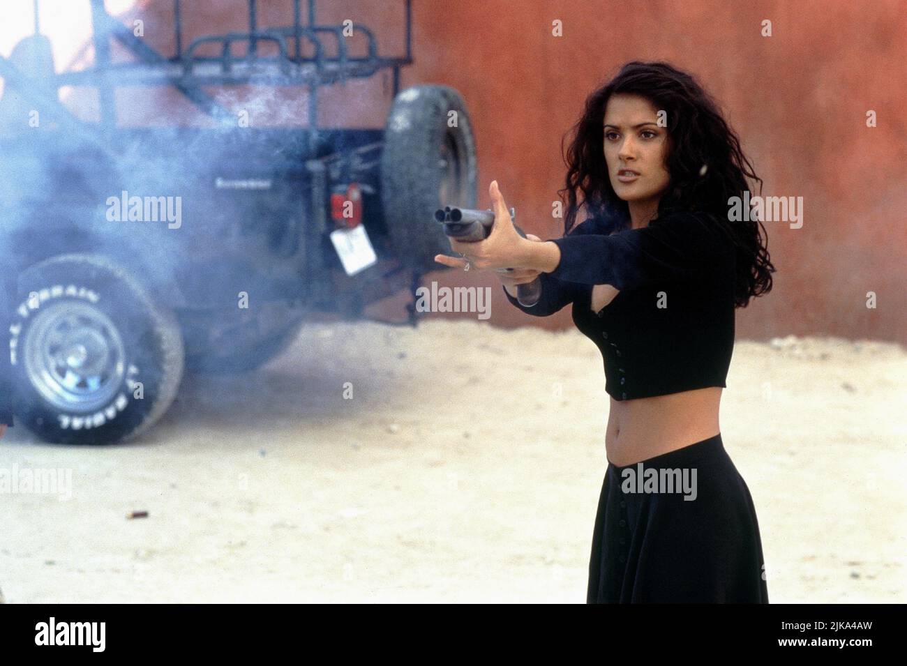 Salma Hayek Film: Desperado (USA 1995) Characters: Carolina  Director: Robert Rodriguez 25 August 1995   **WARNING** This Photograph is for editorial use only and is the copyright of COLUMBIA PICTURES and/or the Photographer assigned by the Film or Production Company and can only be reproduced by publications in conjunction with the promotion of the above Film. A Mandatory Credit To COLUMBIA PICTURES is required. The Photographer should also be credited when known. No commercial use can be granted without written authority from the Film Company. Stock Photo