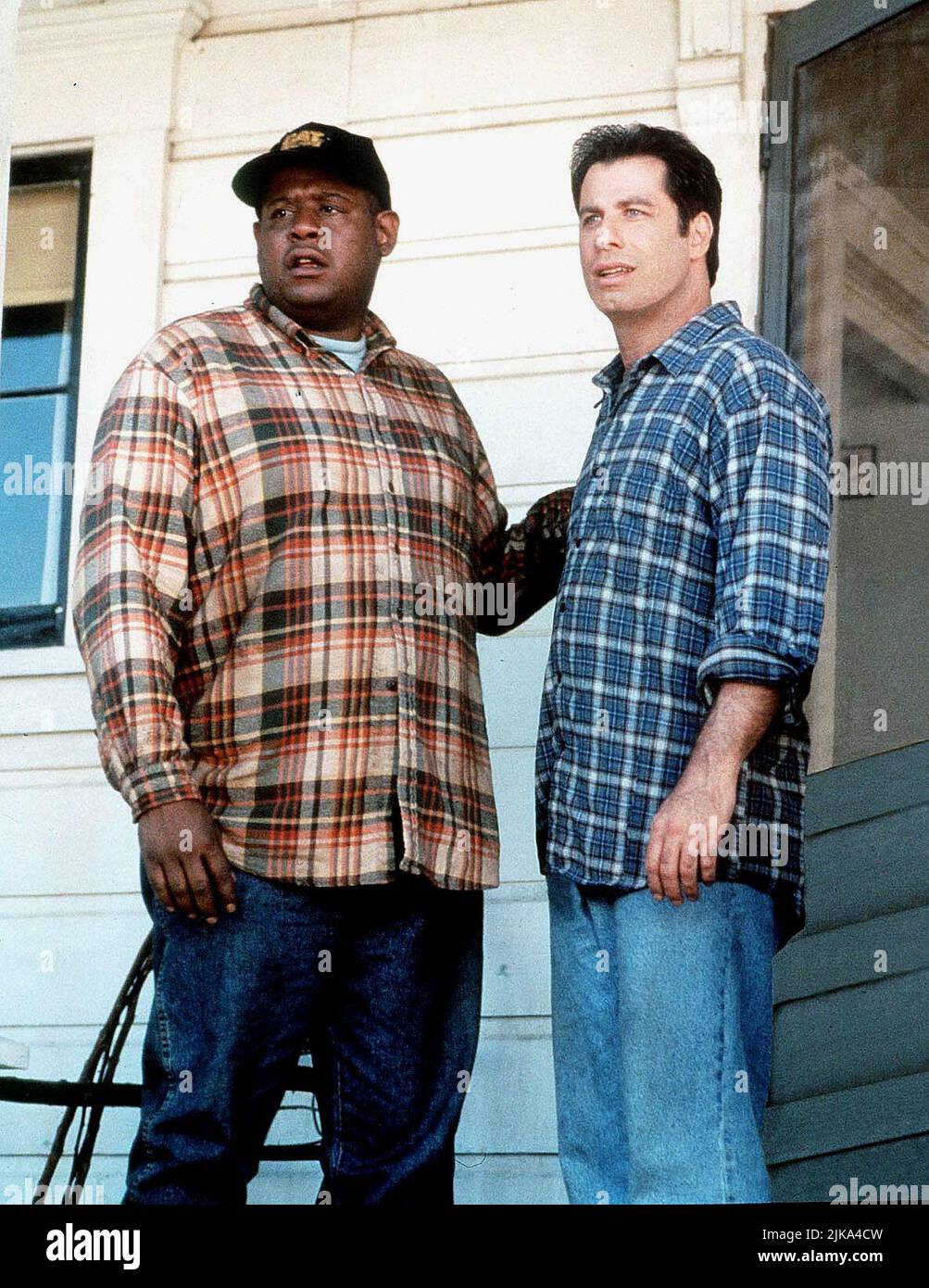 Forest Whitaker & John Travolta Film: Phenomenon (1996) Characters: Nate Pope & George Malley  Director: Jon Turteltaub 03 July 1996   **WARNING** This Photograph is for editorial use only and is the copyright of TOUCHSTONE and/or the Photographer assigned by the Film or Production Company and can only be reproduced by publications in conjunction with the promotion of the above Film. A Mandatory Credit To TOUCHSTONE is required. The Photographer should also be credited when known. No commercial use can be granted without written authority from the Film Company. Stock Photo