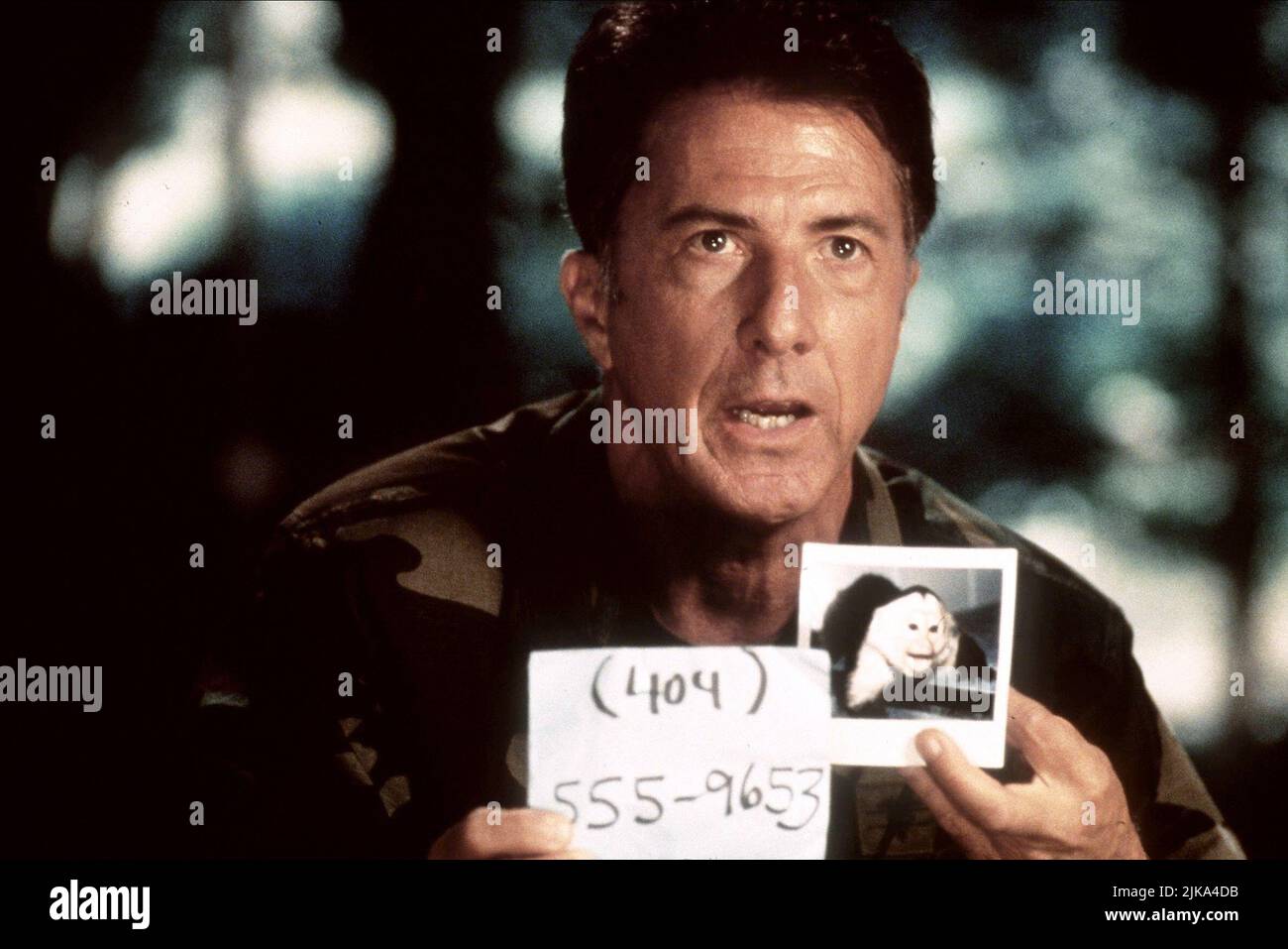 Dustin Hoffman Film: Outbreak (USA 1995) Characters: Col. Sam Daniels  Director: Wolfgang Petersen 06 March 1995   **WARNING** This Photograph is for editorial use only and is the copyright of WARNER BROS. and/or the Photographer assigned by the Film or Production Company and can only be reproduced by publications in conjunction with the promotion of the above Film. A Mandatory Credit To WARNER BROS. is required. The Photographer should also be credited when known. No commercial use can be granted without written authority from the Film Company. Stock Photo