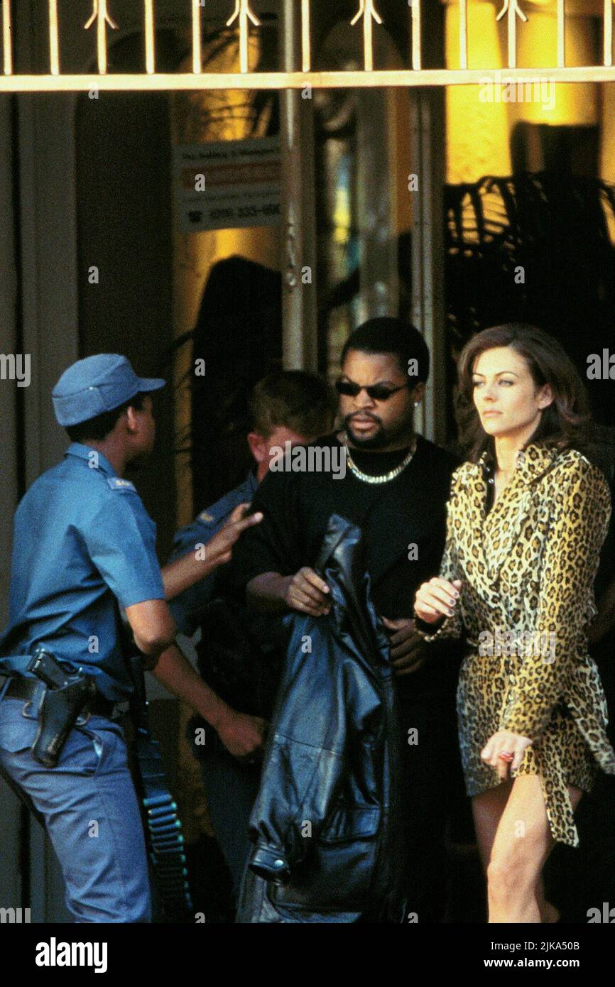 Ice Cube & Elizabeth Hurley Film: Dangerous Ground (1997) Characters: Vusi Madlazi & Karen  Director: Darrell Roodt 12 September 1997   **WARNING** This Photograph is for editorial use only and is the copyright of NEW LINE CINEMA and/or the Photographer assigned by the Film or Production Company and can only be reproduced by publications in conjunction with the promotion of the above Film. A Mandatory Credit To NEW LINE CINEMA is required. The Photographer should also be credited when known. No commercial use can be granted without written authority from the Film Company. Stock Photo