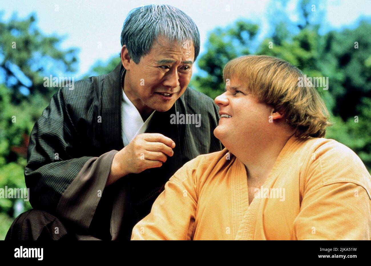 Soon-Tek Oh & Chris Farley Film: Beverly Hills Ninja (1997) Characters: Sensei & Haru  Director: Dennis Dugan 17 January 1997   **WARNING** This Photograph is for editorial use only and is the copyright of TRISTAR and/or the Photographer assigned by the Film or Production Company and can only be reproduced by publications in conjunction with the promotion of the above Film. A Mandatory Credit To TRISTAR is required. The Photographer should also be credited when known. No commercial use can be granted without written authority from the Film Company. Stock Photo