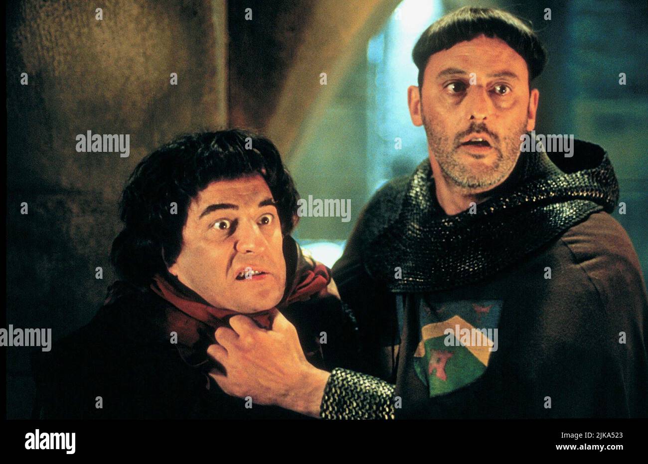 Christian Clavier & Jean Reno Film: Corridors Of Time: Visitors Ii (1998) Characters: Jacquouille la Fripouille & Comte Godefroy de Montmirail, dit Godefroy le Hardi  Director: Jean-Marie Poire 11 February 1998   **WARNING** This Photograph is for editorial use only and is the copyright of LE STUDIO CANAL and/or the Photographer assigned by the Film or Production Company and can only be reproduced by publications in conjunction with the promotion of the above Film. A Mandatory Credit To LE STUDIO CANAL is required. The Photographer should also be credited when known. No commercial use can be g Stock Photo