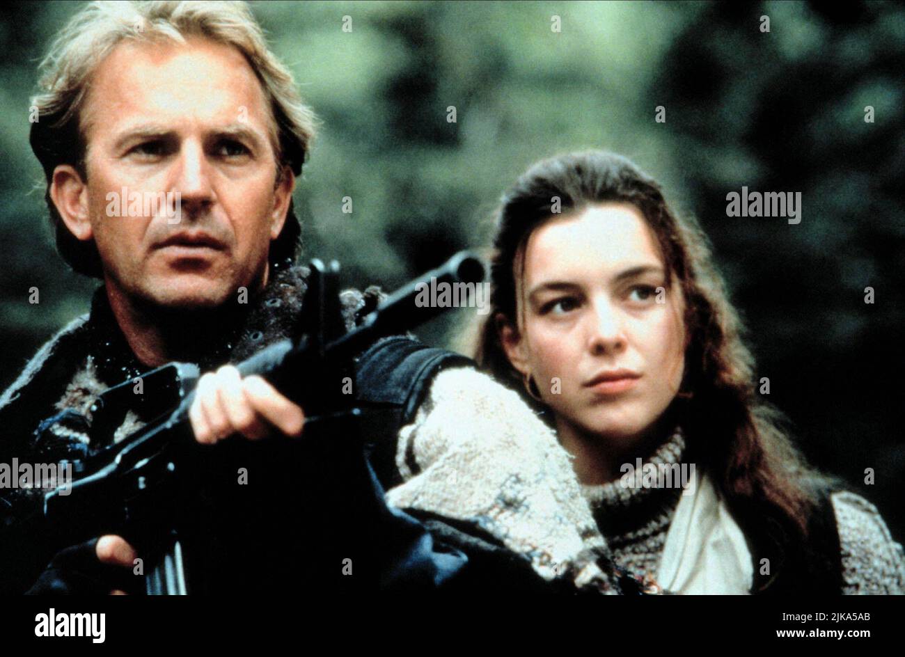 Kevin Costner, Olivia Williams Film: The Postman (1997) Characters: The Postman,Abby  Director: Kevin Costner 12 December 1997   **WARNING** This Photograph is for editorial use only and is the copyright of WARNER BROS and/or the Photographer assigned by the Film or Production Company and can only be reproduced by publications in conjunction with the promotion of the above Film. A Mandatory Credit To WARNER BROS is required. The Photographer should also be credited when known. No commercial use can be granted without written authority from the Film Company. Stock Photo