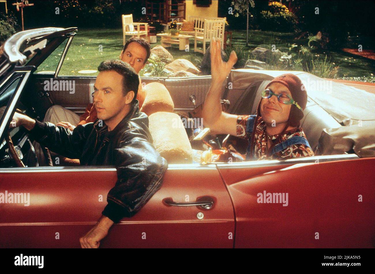 Michael Keaton Film: Multiplicity (USA 1996) Characters: Doug Kinney, Doug Kinney & Doug Kinney  / 965 Chevrolet Impala Super Spor Director: Harold Ramis 27 June 1996   **WARNING** This Photograph is for editorial use only and is the copyright of COLUMBIA and/or the Photographer assigned by the Film or Production Company and can only be reproduced by publications in conjunction with the promotion of the above Film. A Mandatory Credit To COLUMBIA is required. The Photographer should also be credited when known. No commercial use can be granted without written authority from the Film Company. Stock Photo