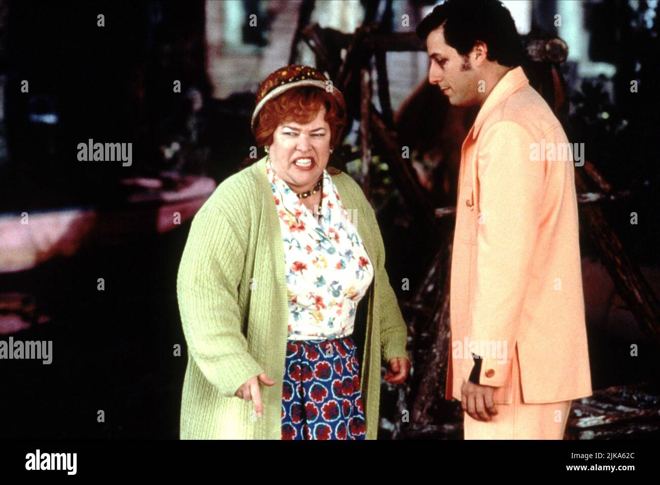Kathy Bates & Adam Sandler Film: The Waterboy (1998) Characters: Helen 'Mama' Boucher & Robert 'Bobby' Boucher Jr.  Director: Frank Coraci 06 November 1998   **WARNING** This Photograph is for editorial use only and is the copyright of TOUCHSTONE and/or the Photographer assigned by the Film or Production Company and can only be reproduced by publications in conjunction with the promotion of the above Film. A Mandatory Credit To TOUCHSTONE is required. The Photographer should also be credited when known. No commercial use can be granted without written authority from the Film Company. Stock Photo