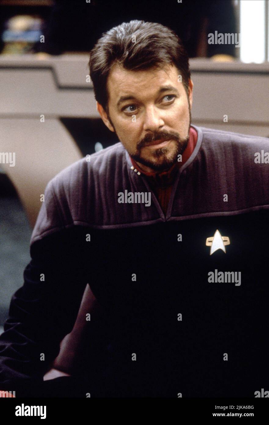 Jonathan Frakes Film: Star Trek: First Contact (USA 1996) Characters: Commander William Riker  / Star Trek Viii Director: Jonathan Frakes 18 November 1996   **WARNING** This Photograph is for editorial use only and is the copyright of PARAMOUNT and/or the Photographer assigned by the Film or Production Company and can only be reproduced by publications in conjunction with the promotion of the above Film. A Mandatory Credit To PARAMOUNT is required. The Photographer should also be credited when known. No commercial use can be granted without written authority from the Film Company. Stock Photo