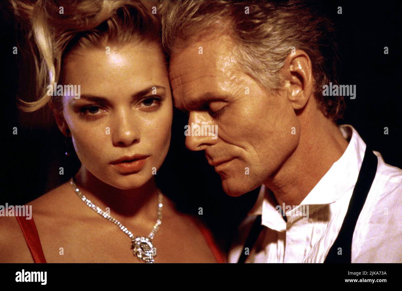 Jaime Pressly & Michael Des Barres Film: Poison Ivy: The New Seduction (1997) Characters: Violet, Ivan Greer  Director: Kurt Voss 20 May 1997   **WARNING** This Photograph is for editorial use only and is the copyright of NEW LINE CINEMA and/or the Photographer assigned by the Film or Production Company and can only be reproduced by publications in conjunction with the promotion of the above Film. A Mandatory Credit To NEW LINE CINEMA is required. The Photographer should also be credited when known. No commercial use can be granted without written authority from the Film Company. Stock Photo