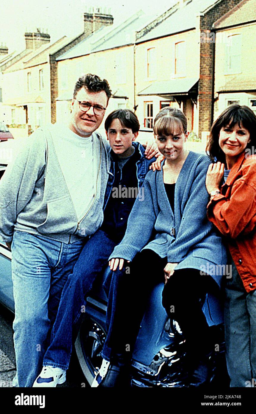 Gary Olsen, John Pickard, Clare Buckfield, Belinda Lang Television: 2point4 Children (1995) Characters: Ben Porter,David Porter,Jenny Porter,Bill Porter  03 September 1996   **WARNING** This Photograph is for editorial use only and is the copyright of BBC and/or the Photographer assigned by the Film or Production Company and can only be reproduced by publications in conjunction with the promotion of the above Film. A Mandatory Credit To BBC is required. The Photographer should also be credited when known. No commercial use can be granted without written authority from the Film Company. Stock Photo