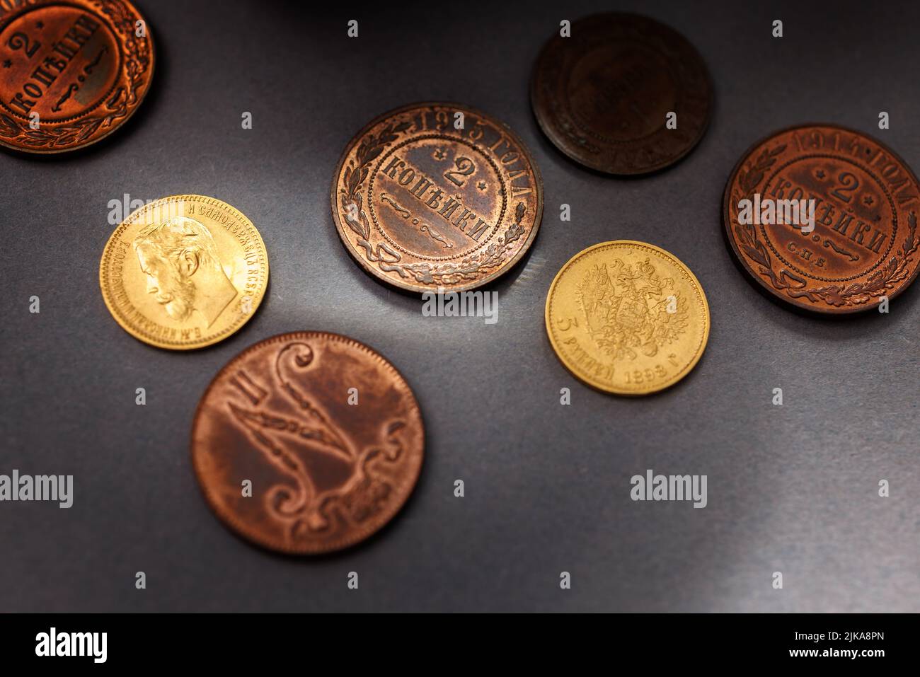 Numismatics. Old collectible coins on the table Stock Photo - Alamy