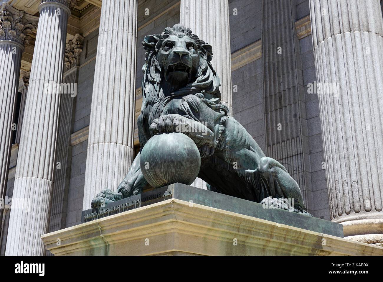 The Lions of The Congress of Deputies or Congreso de los Diputados,at the Plaza de las Cortes,the lower house of the Spanish Parliament.Madrid Spain.(made by Ponciano Ponzano y Gascón (1813 – 1877) a sculptor.) Stock Photo
