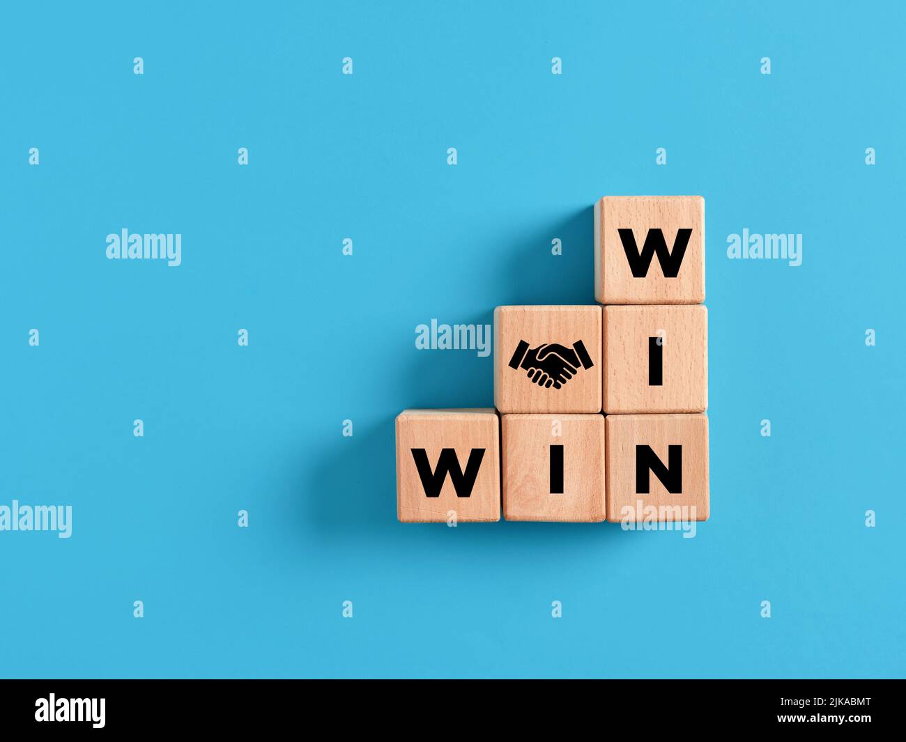 Wooden cube ladder with the word win win. Win win situation in business strategy. Stock Photo