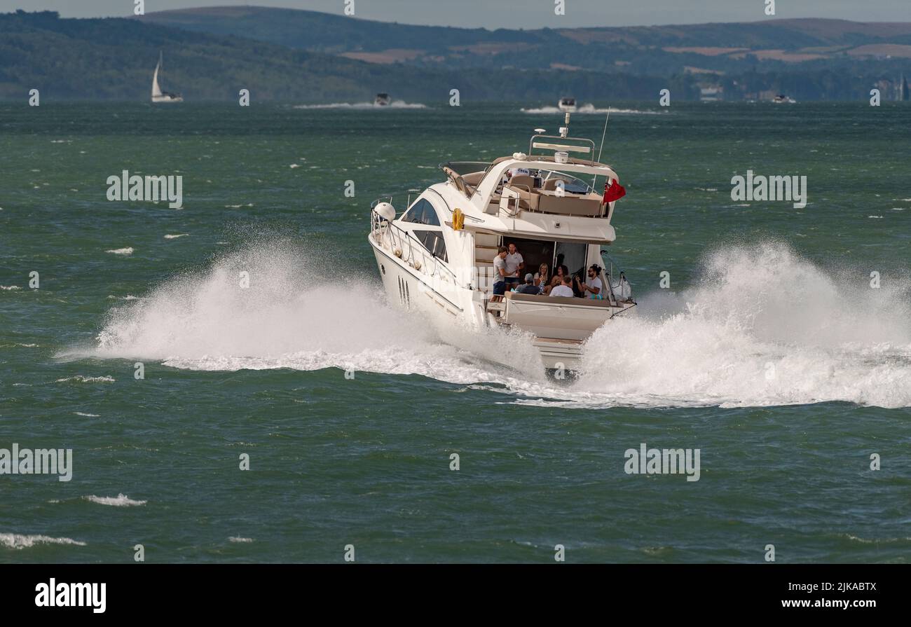 The Solent, southern England, UK. 2022. Luxury powerboat underway crossing the Sollent towards the Isle of Wight, UK Stock Photo