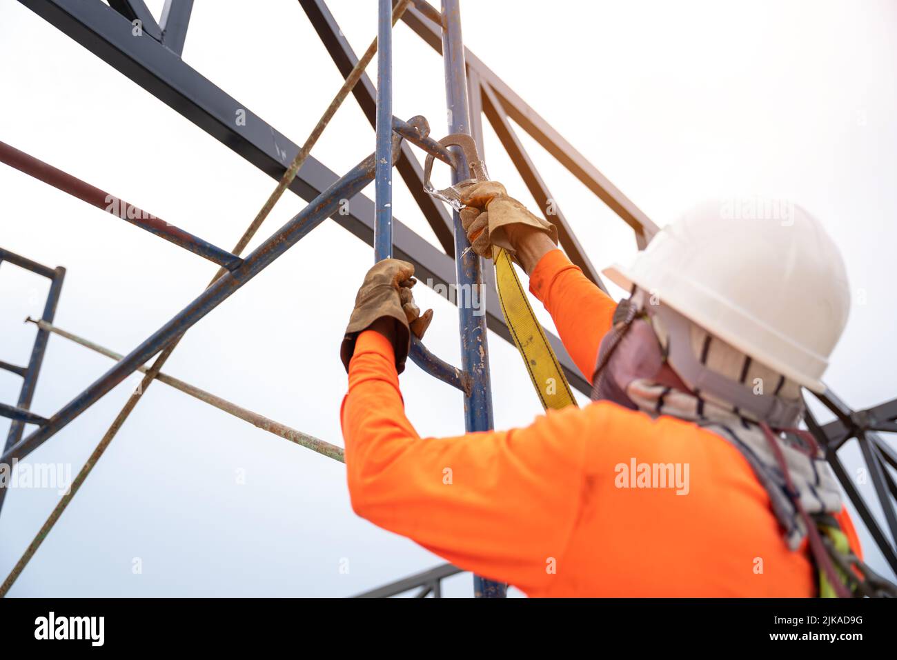 Construction workers are using safety equipment to prevent falls from heights or Fall arrestor