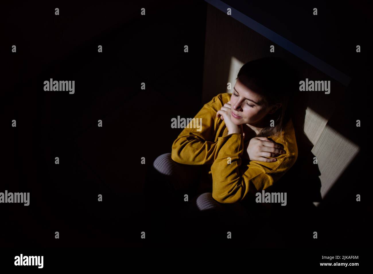 Sad woman holding hand blessings and pray, feeling down, begging for ...