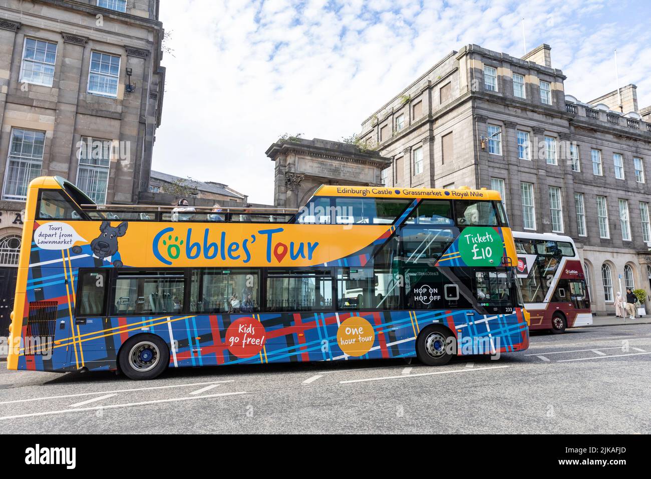 Edinburgh Cobbles tour double decker city explorer bus on Princes street in Edinburgh city centre, summer 2022,Scotland,UK Stock Photo
