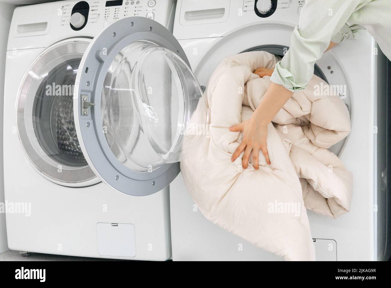 aesthetic laundry concept washing blanket Stock Photo Alamy