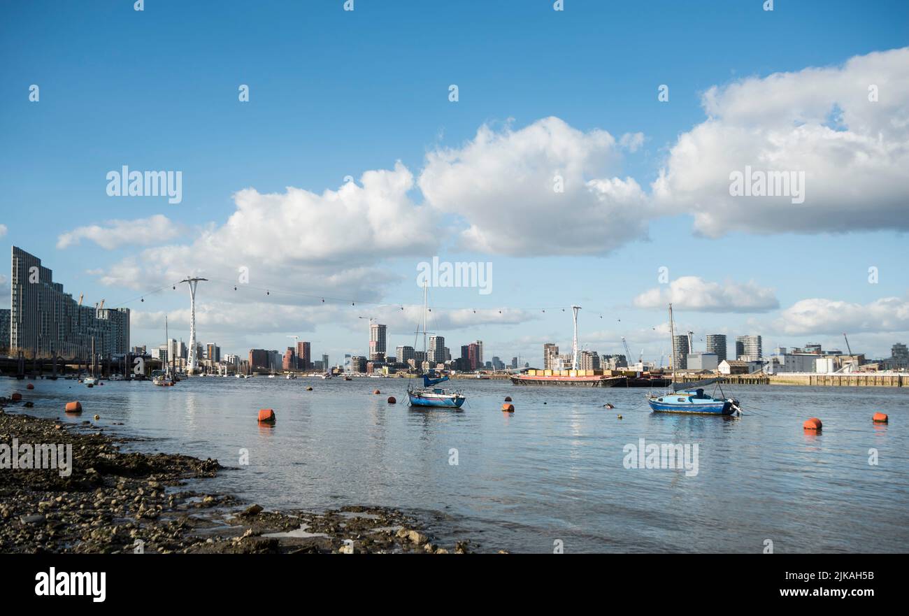 London cityscape, view across the Thames to the Royal Docks and the cable car crossing. Stock Photo