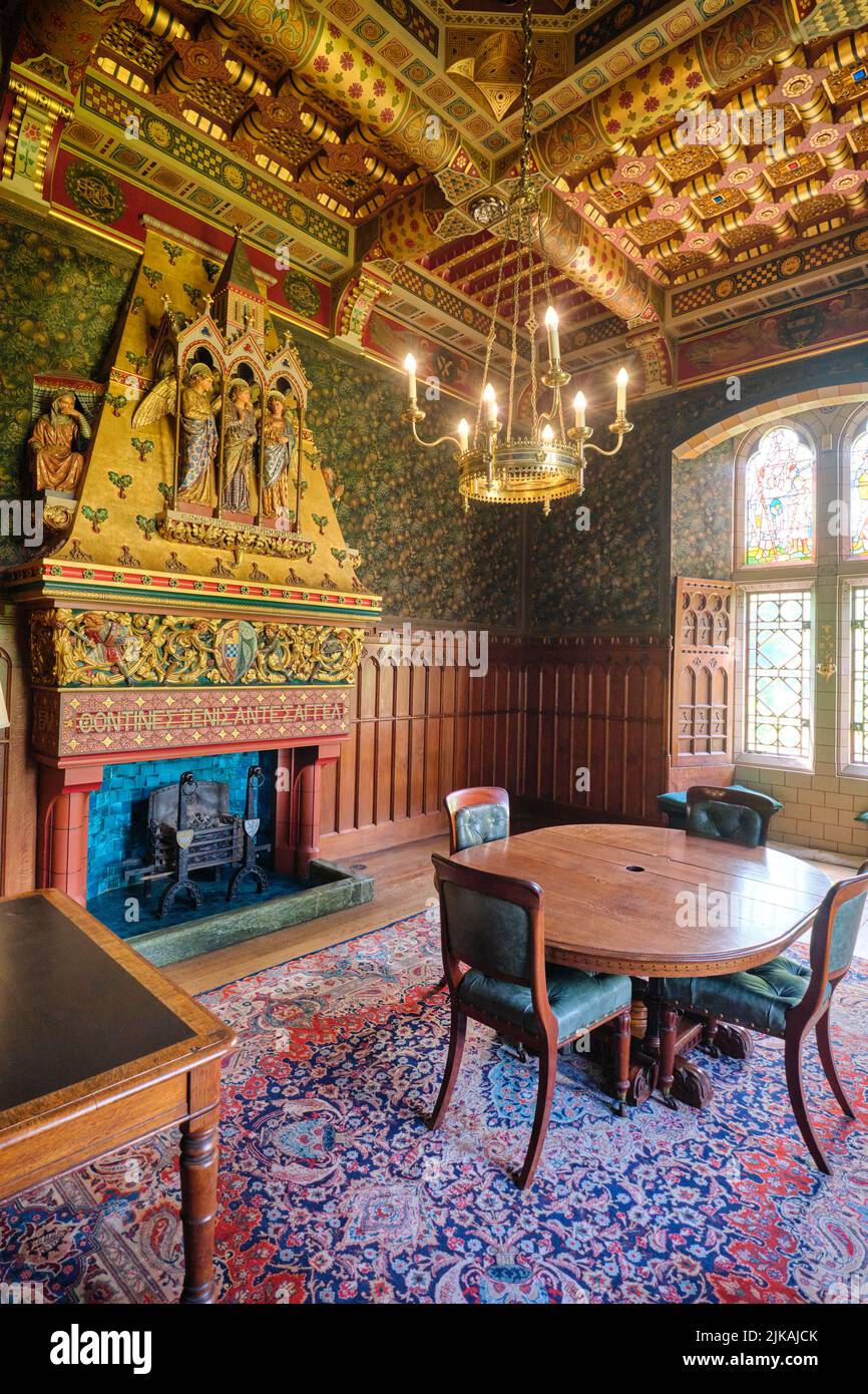 A view of the grand dining room with big, huge fireplace. At Cardiff Castle in Cardiff, Wales, United Kingdom. Stock Photo